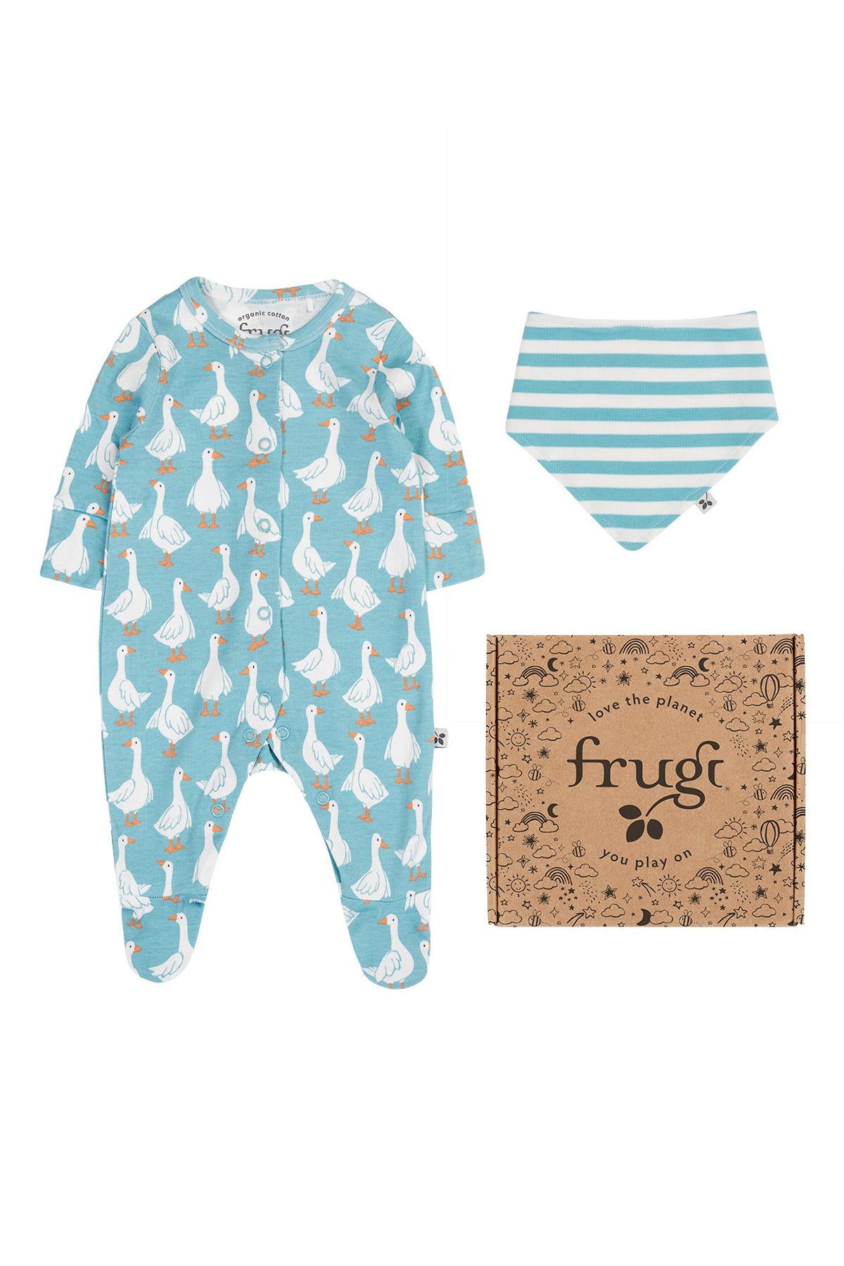 Frugi babygrow with duck pattern, bib, and box from Frugi on a white background