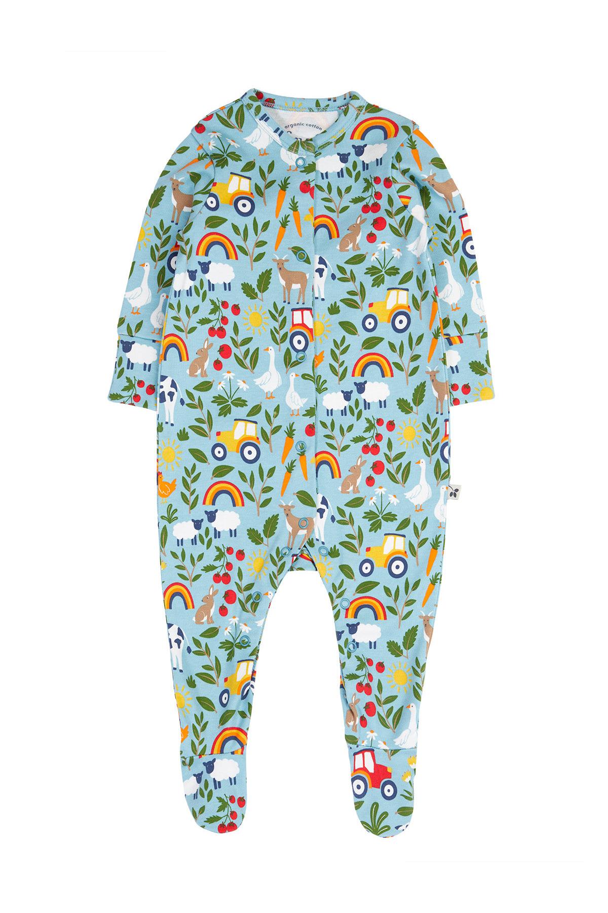 Children's organic cotton babygrow with farm animal and rainbow pattern on a white background
