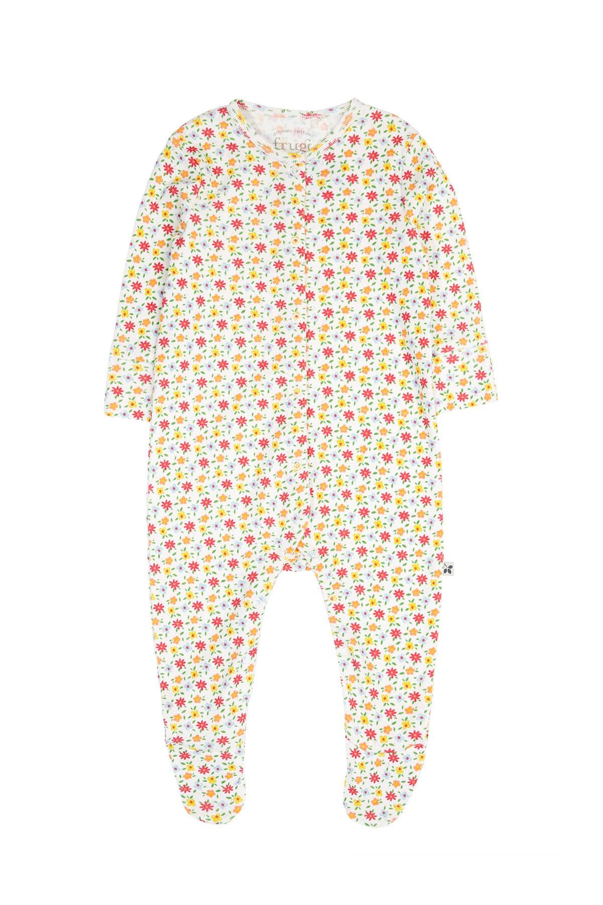 Floral patterned baby onesie on a white background