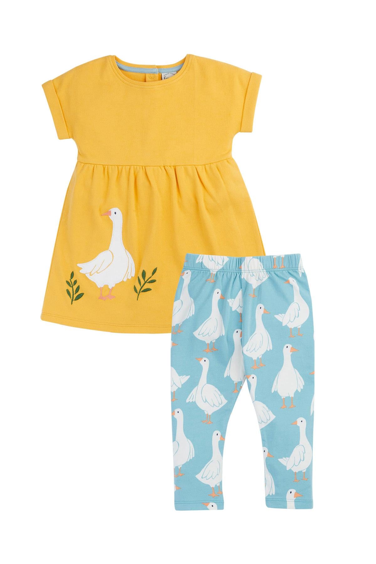 Yellow organic cotton top and blue leggings with goose pattern on a white background