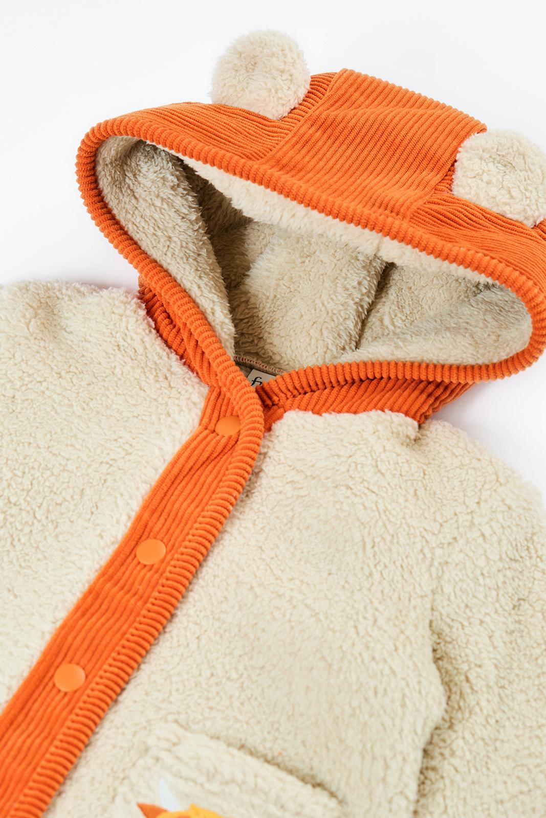Frugi cosy boys fleece jacket in orange and cream with a bear ear hood.