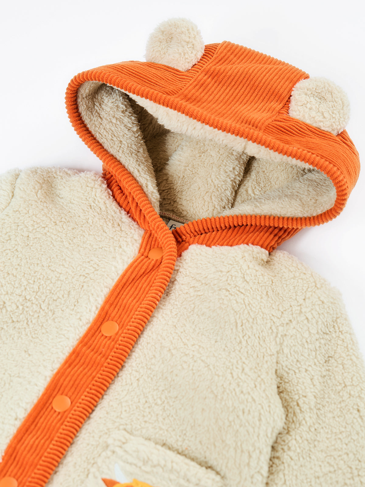 Frugi cosy boys fleece jacket in orange and cream with a bear ear hood.