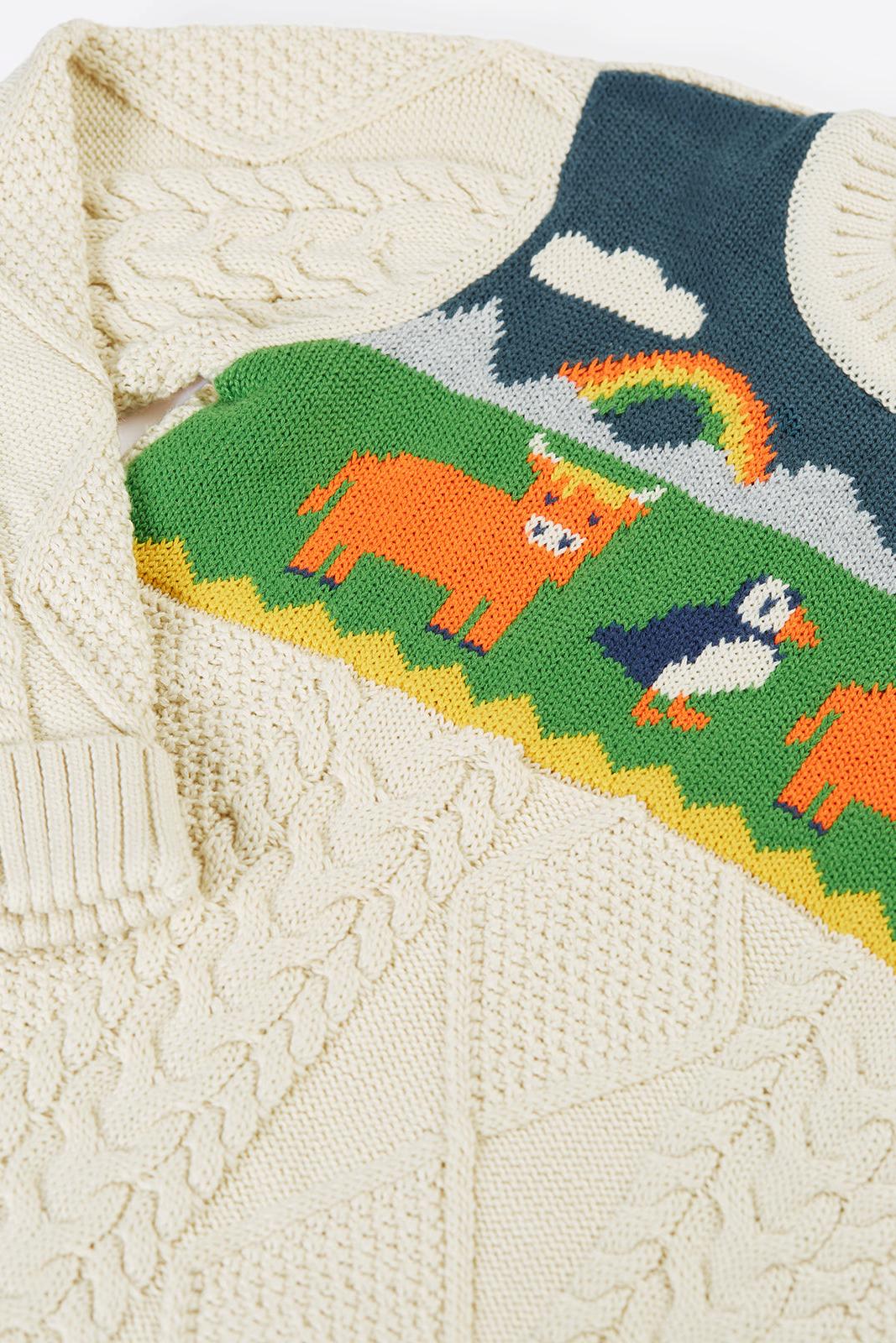 Cream Frugi organic cotton children's aran jumper featuring a colorful animal landscape knit pattern.