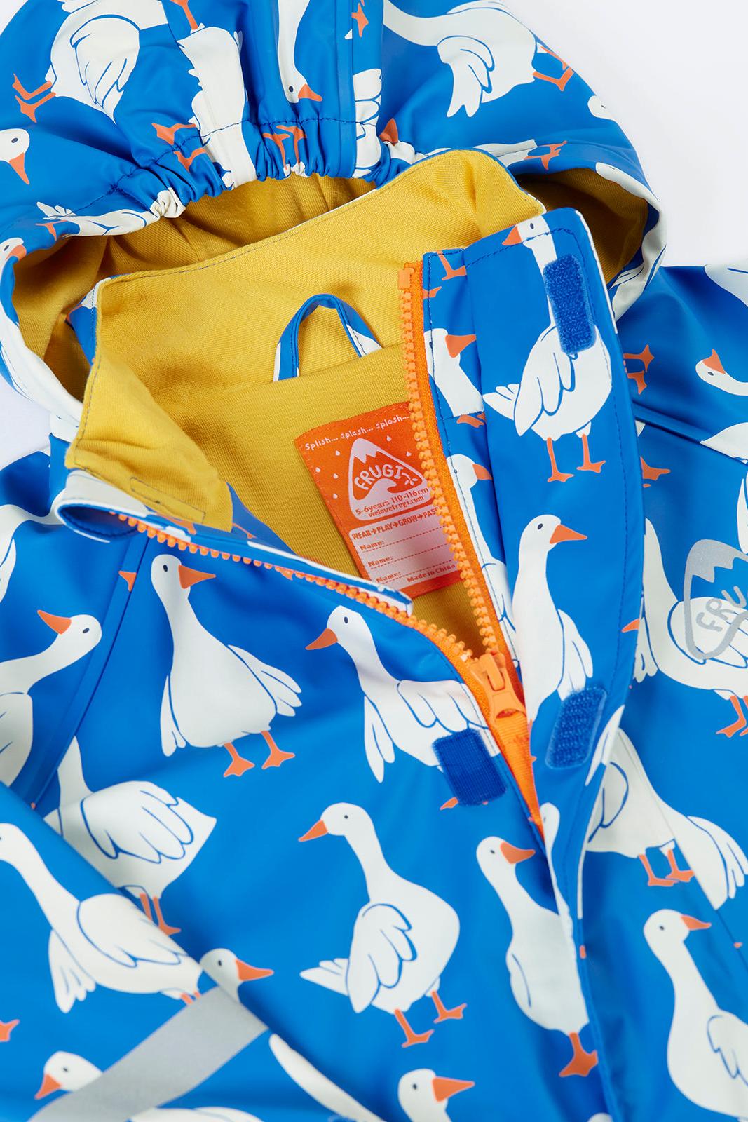 Children's Frugi raincoat with goose pattern on a blue background