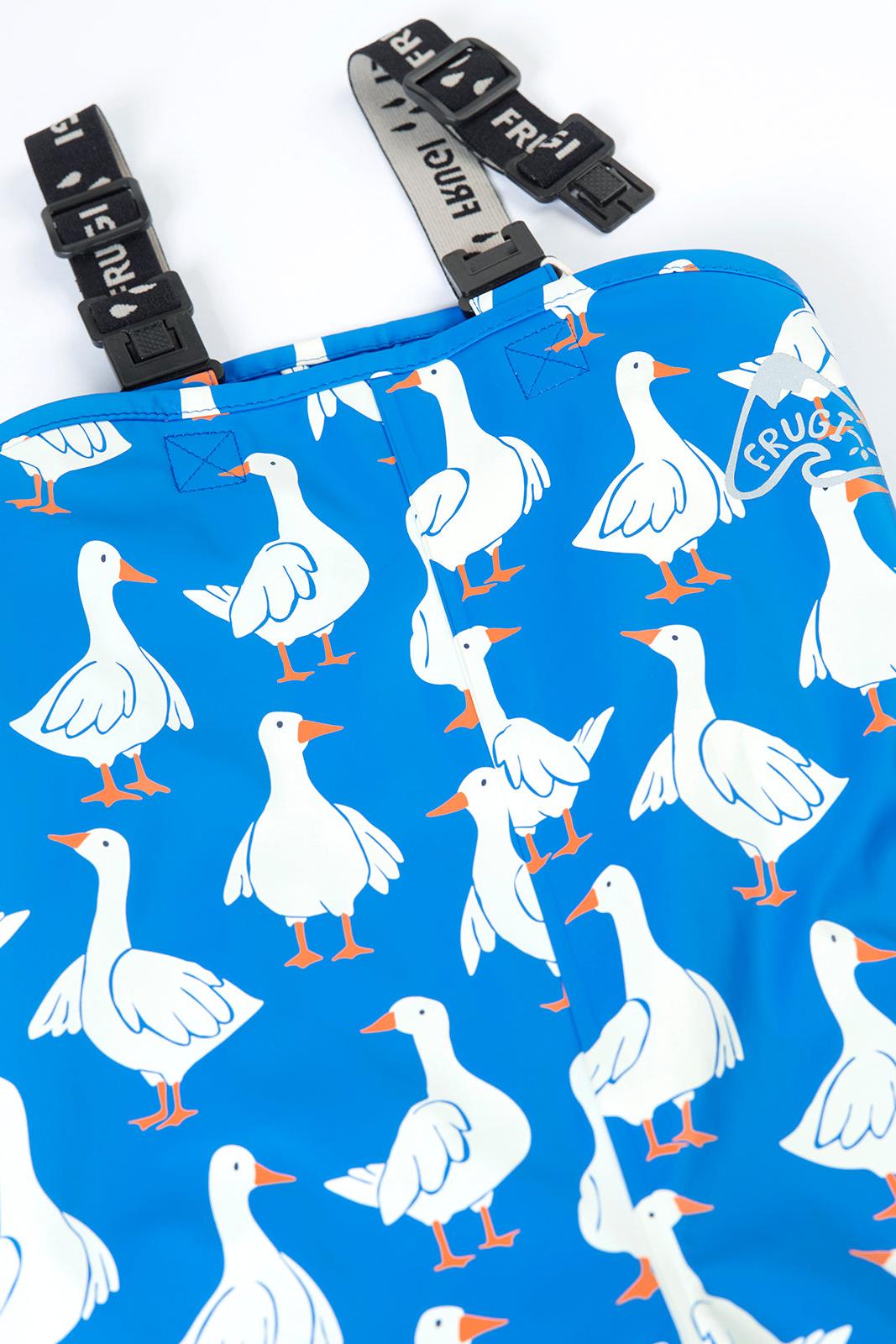 Blue rain trousers with white goose pattern and visible brand name on a white background