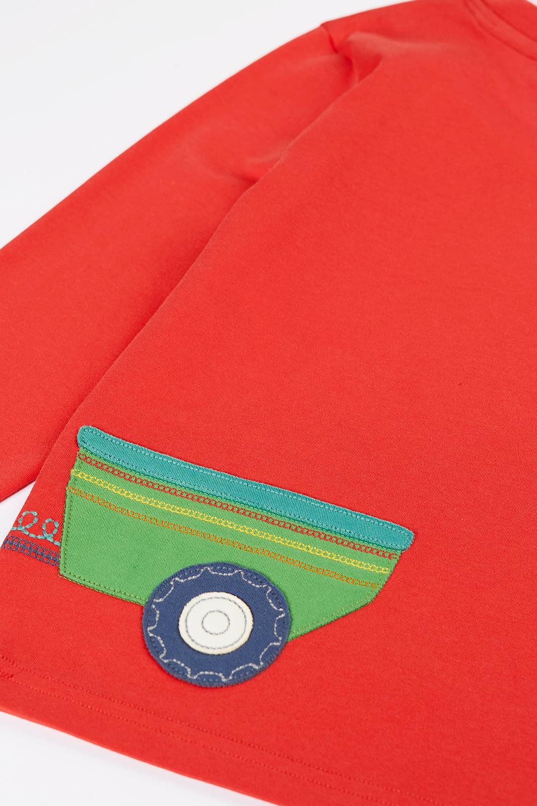 Red Frugi long-sleeve boys top featuring an organic cotton farm tractor applique design.