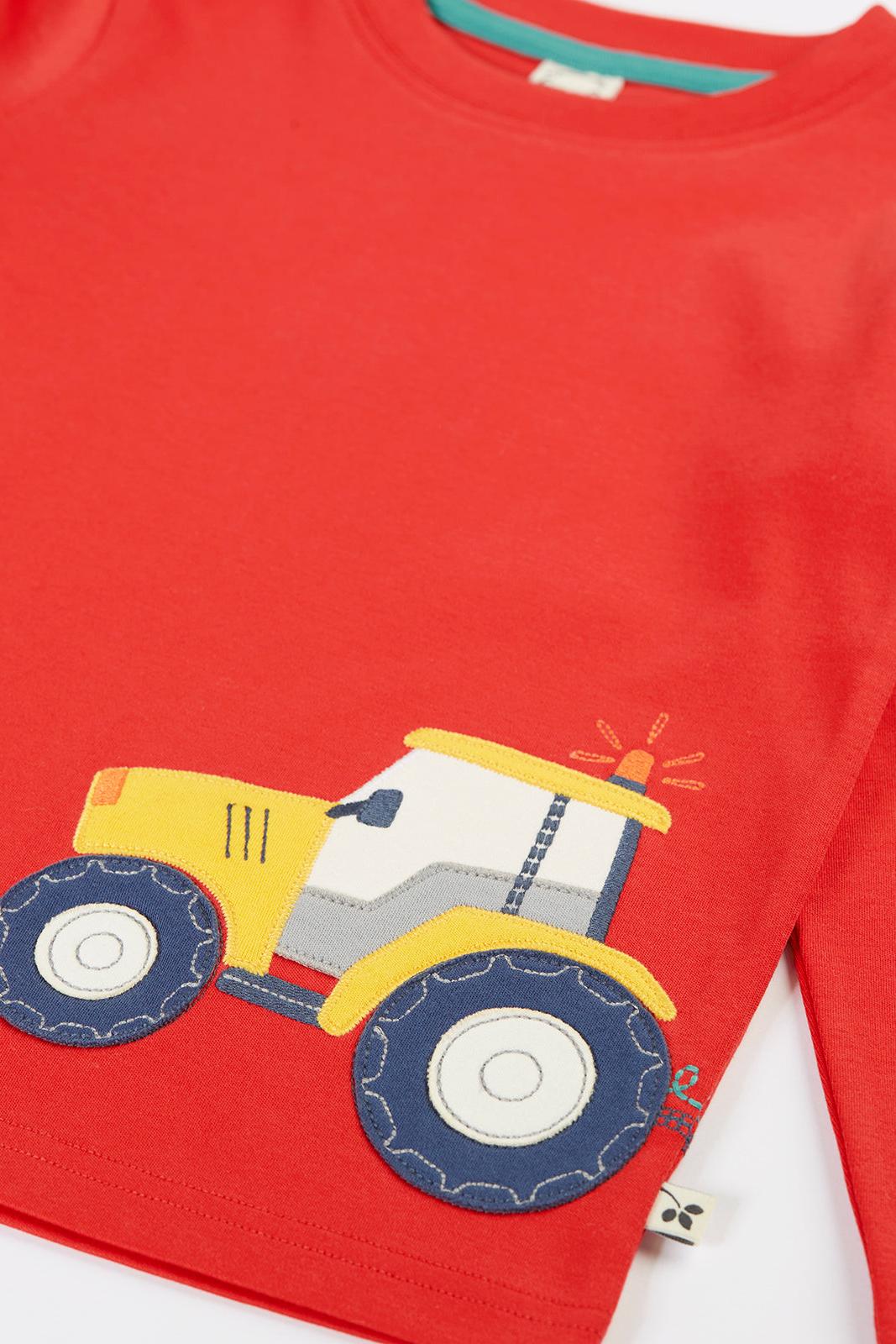 Bright red boys tshirt by Frugi featuring an appliqued yellow farm tractor design on soft organic cotton.