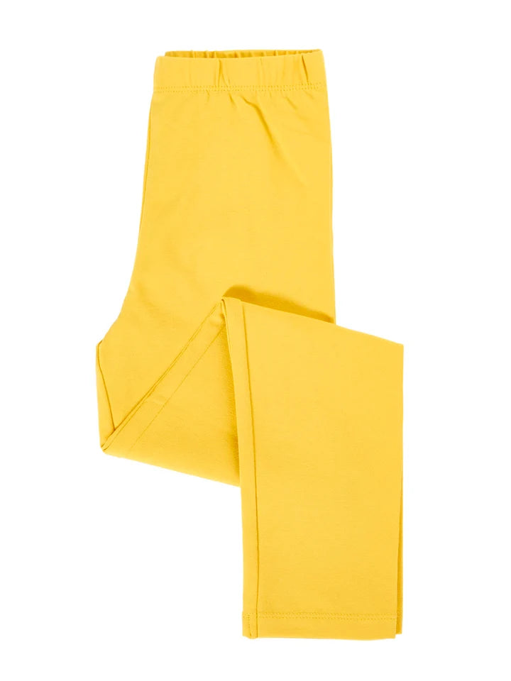 Bright yellow organic cotton kids leggings folded on a plain white background.