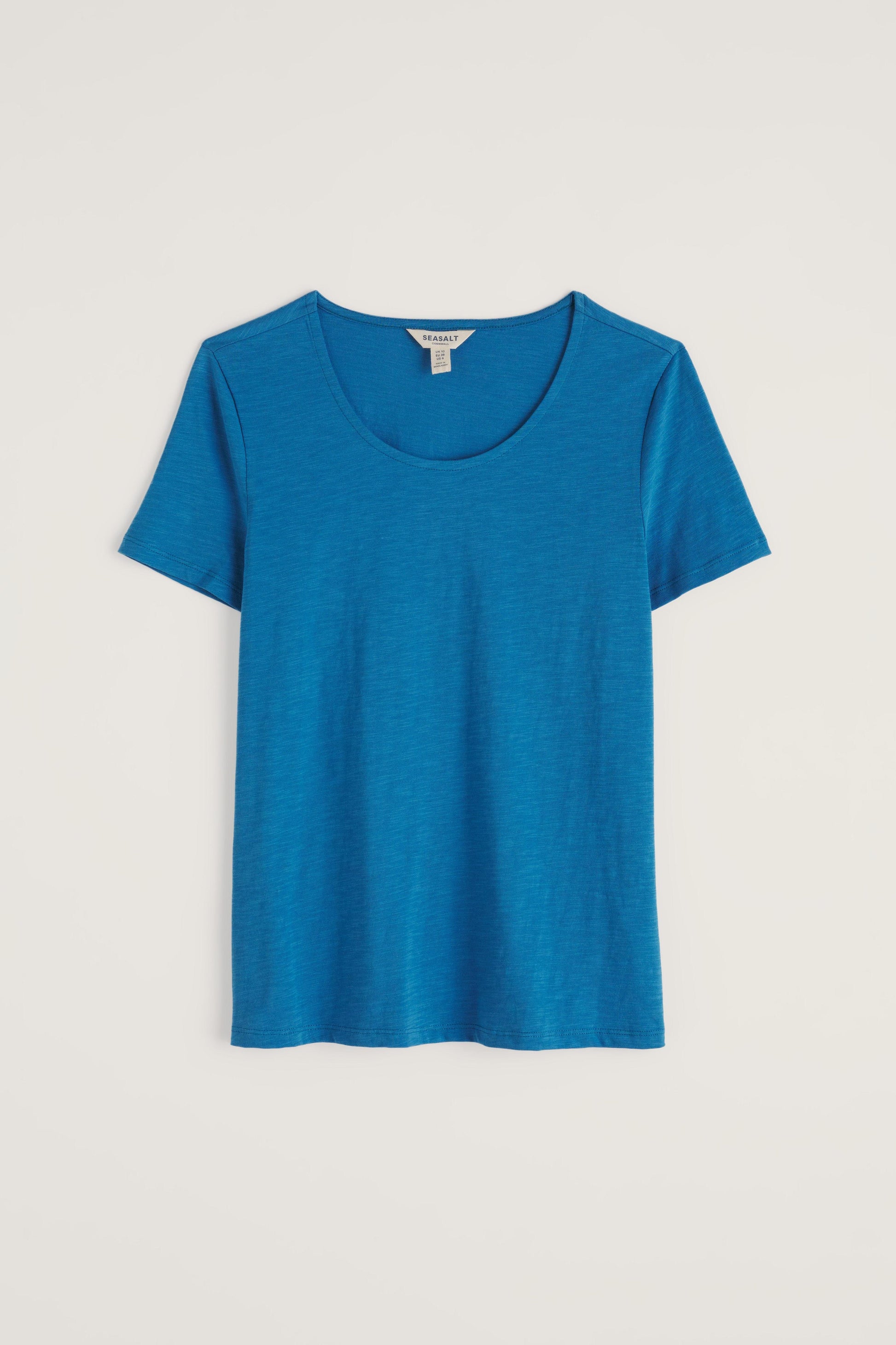 Sustainable blue t-shirt on a light gray background