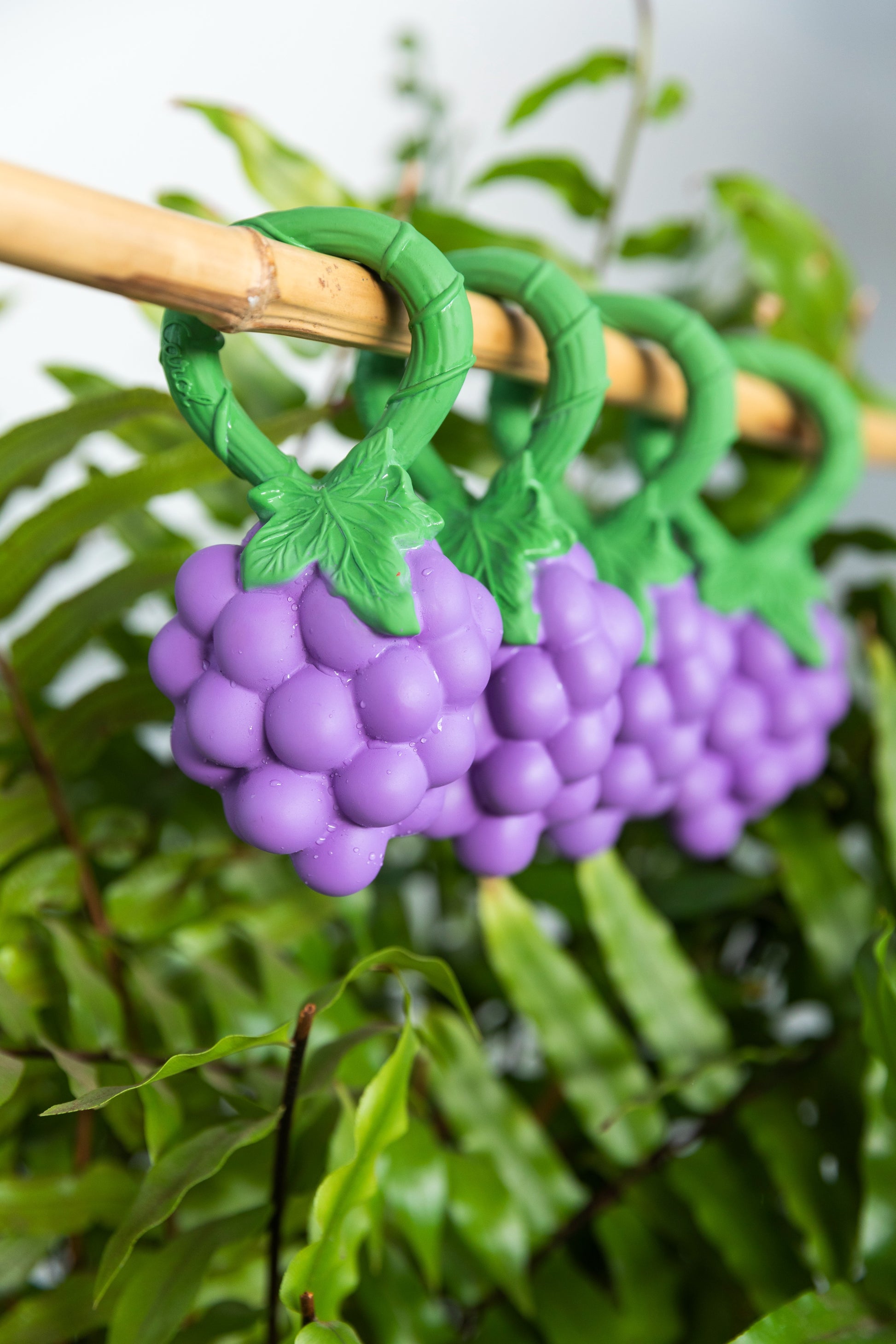Handcrafted grape-shaped baby rattle and teether, soft, textured, and soothing, ideal for sensory play and teething relief.