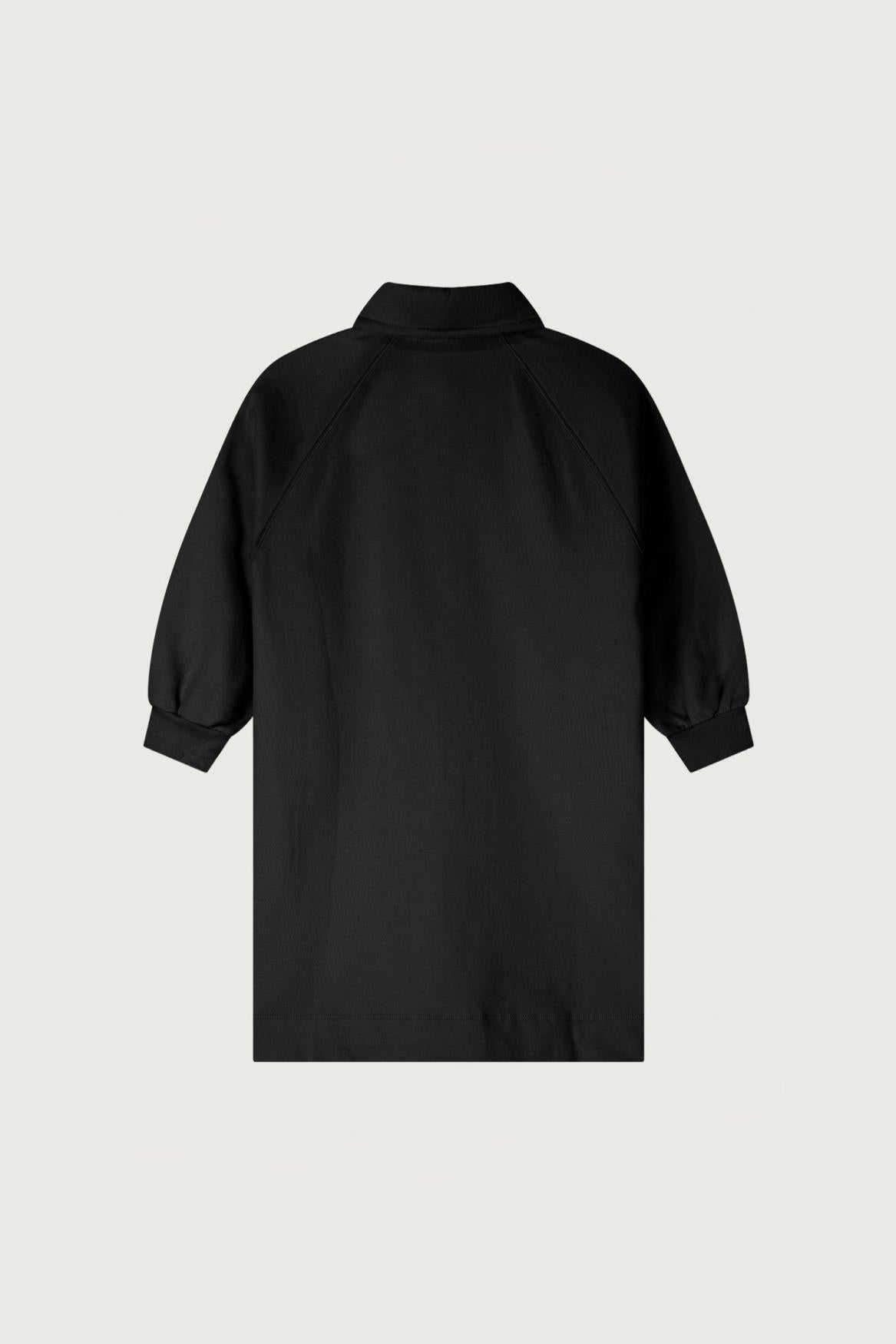A black long-sleeve collared shirt with cuffed, balloon-style sleeves, shown from the back against a light gray background.