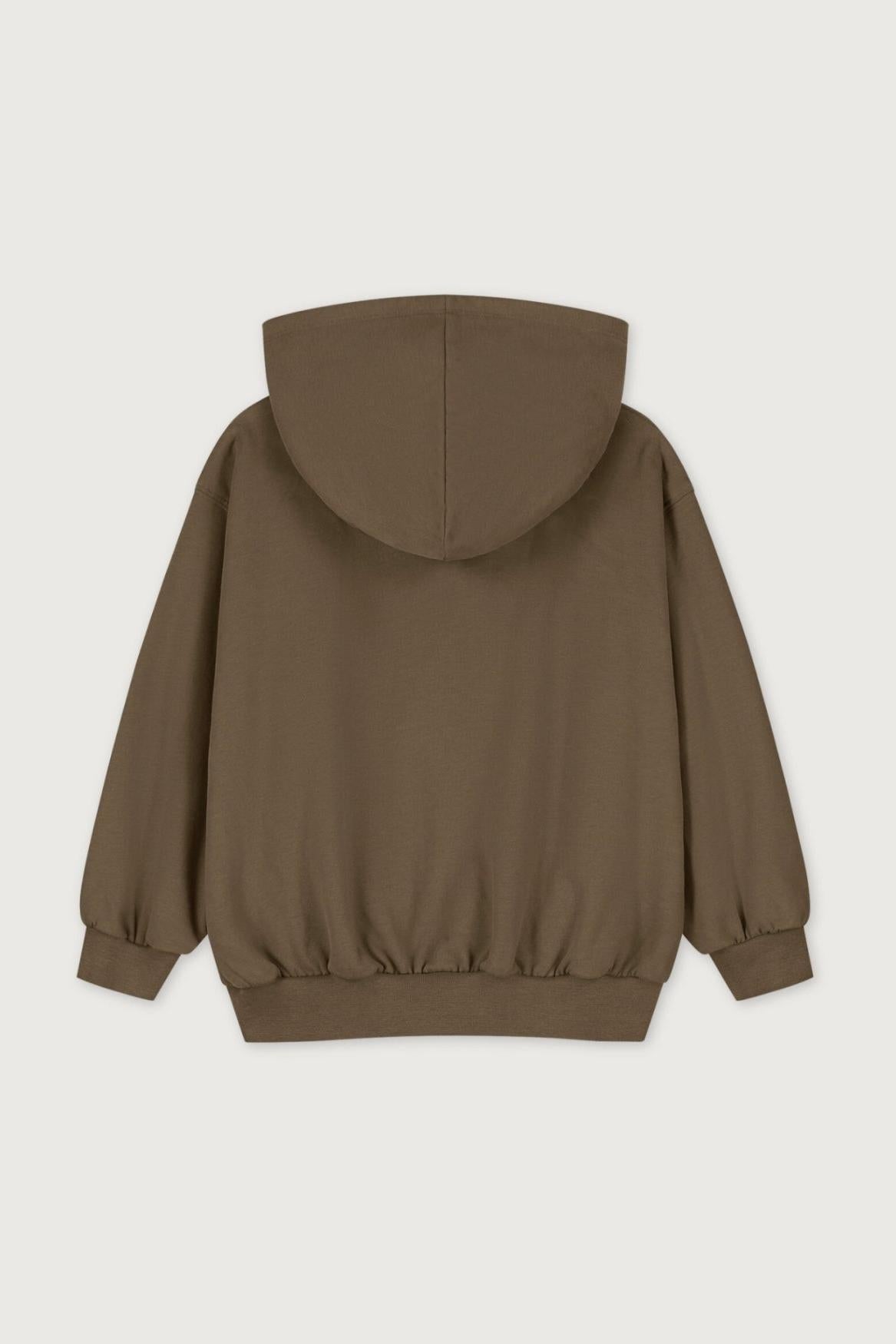 Brown hoodie on a light beige background