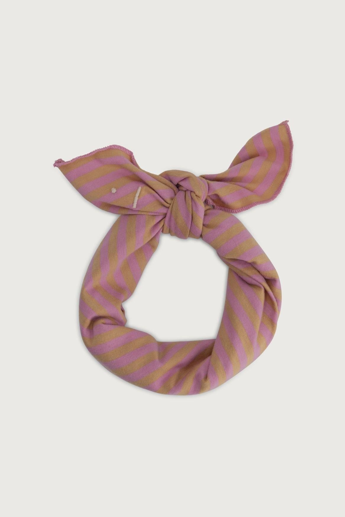 Striped headband with a bow on a light gray background