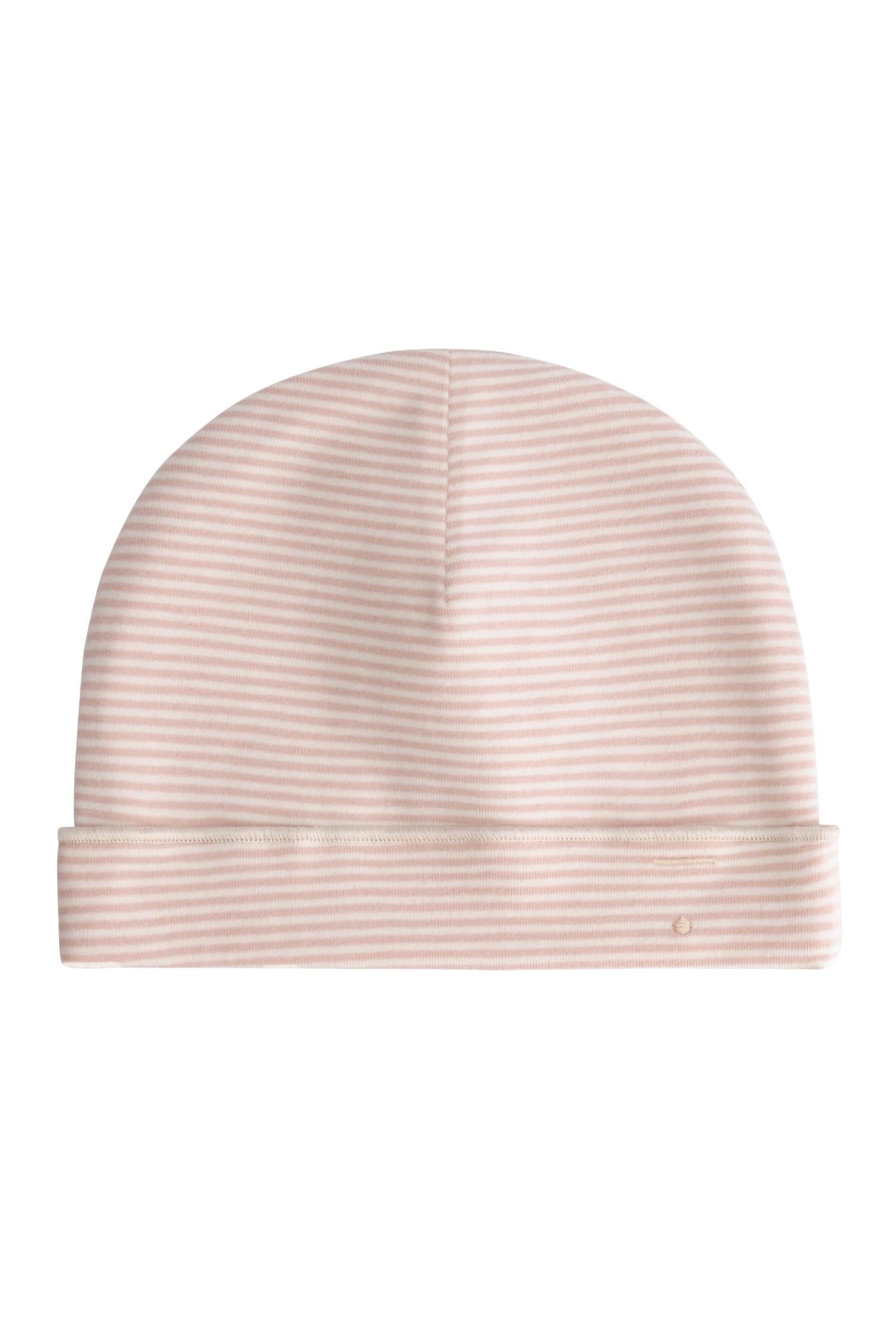 Pink striped baby hat on a white background