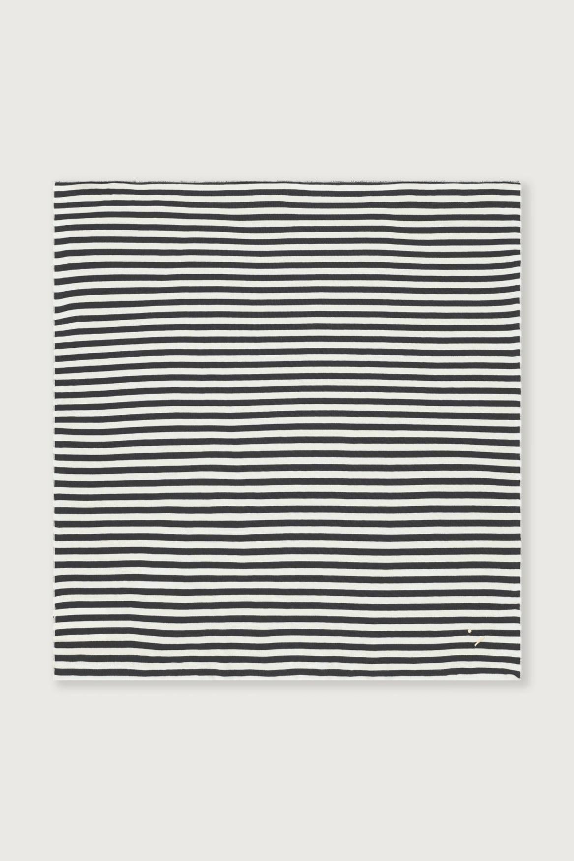 A rectangular scarf with a horizontal black and white stripe pattern, displayed flat against a light gray background.