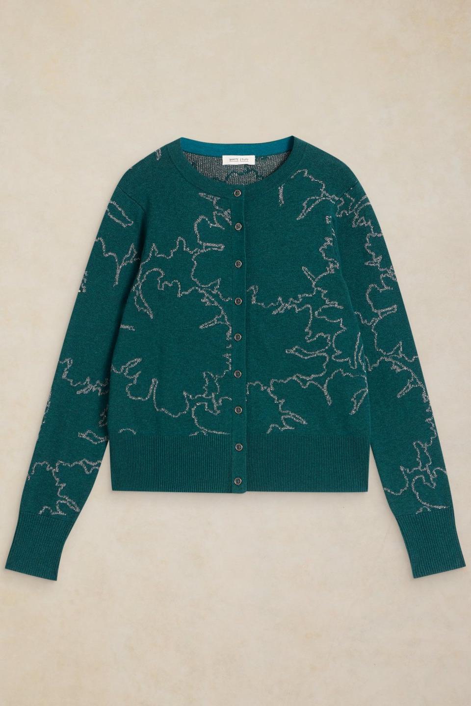 A green White Stuff knit cardigan with metallic sparkle detailing and button-up front.