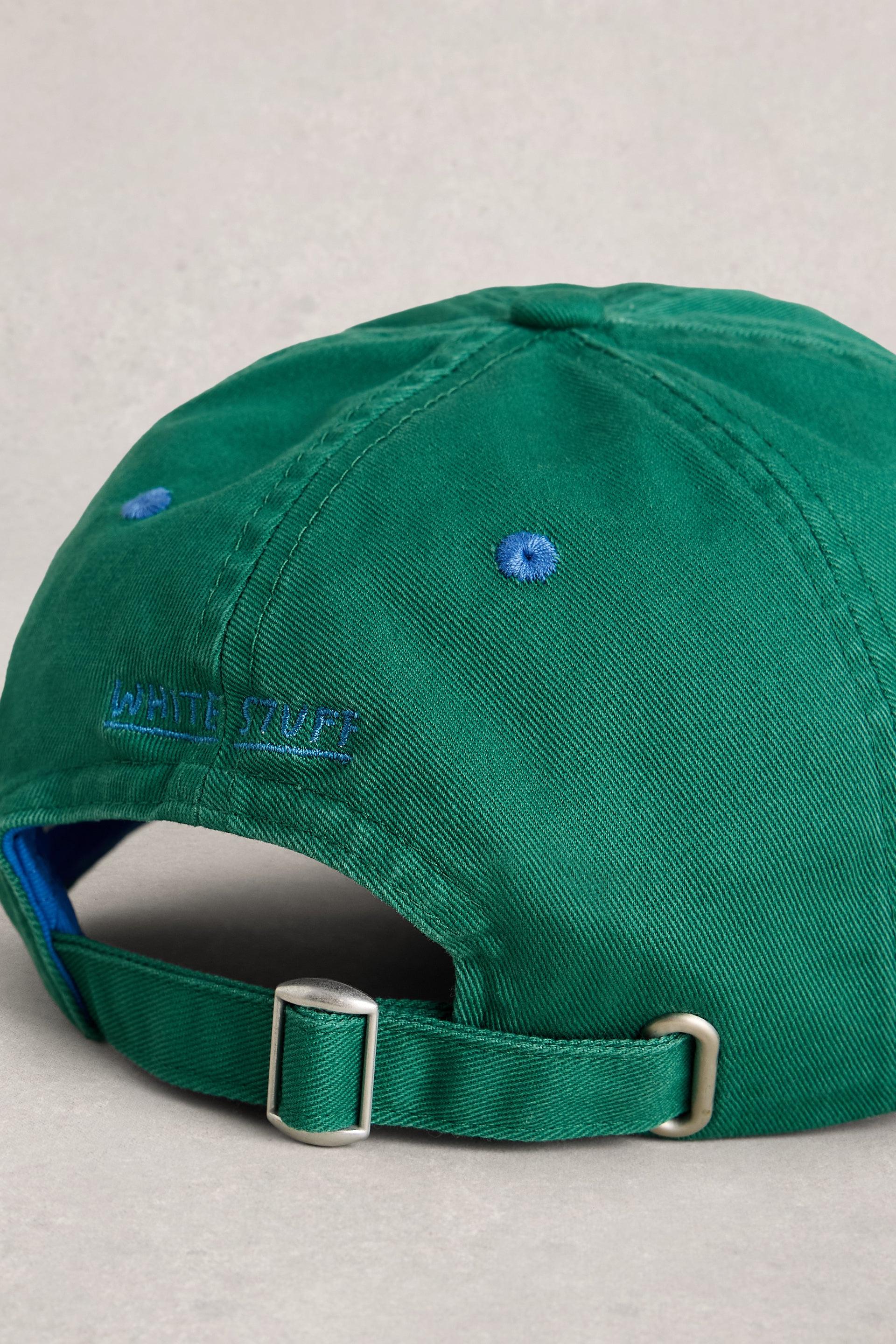 Green baseball cap with blue White Stuff branding