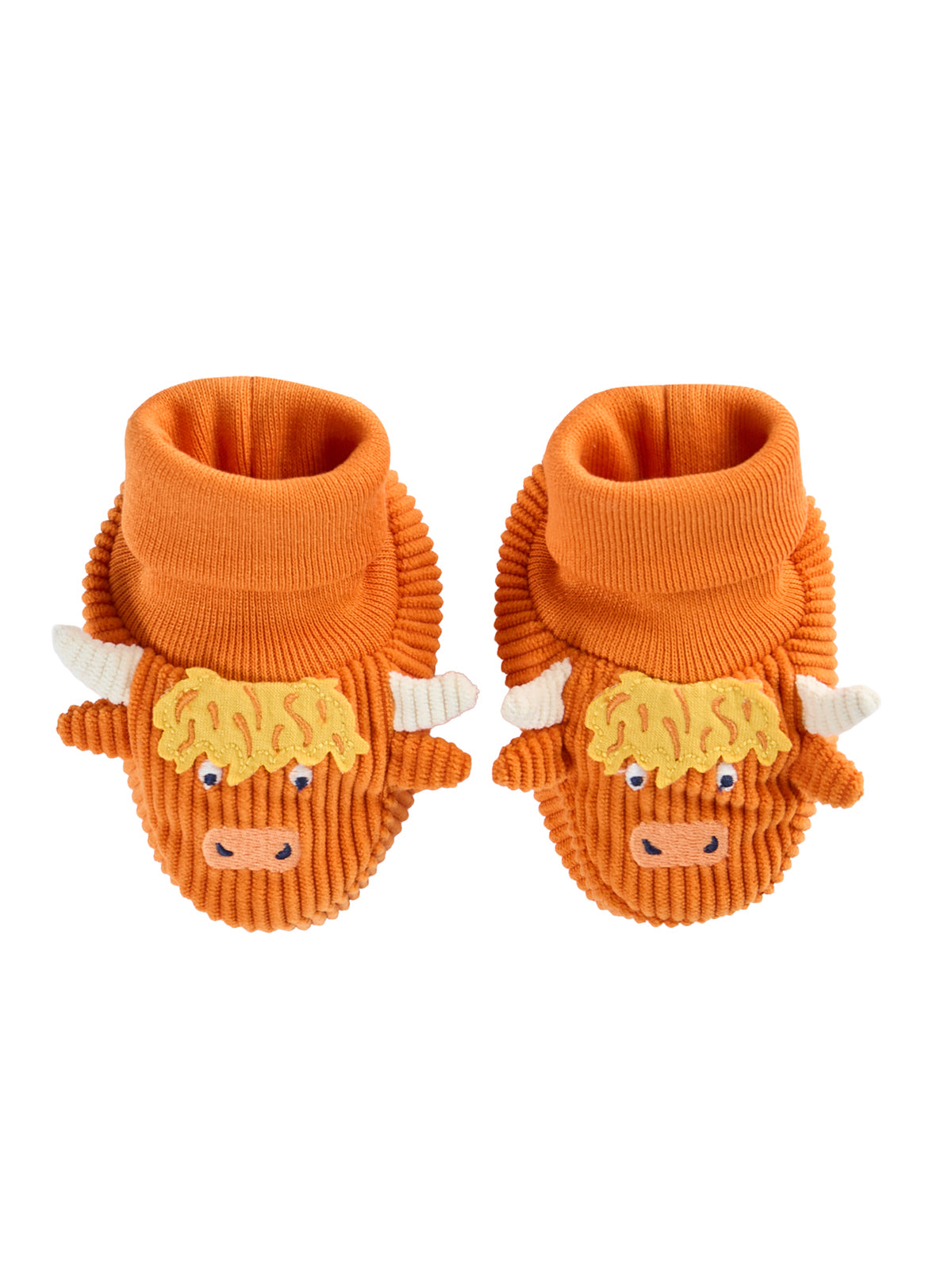 A pair of orange Frugi baby booties featuring a cute highland cow design with textured fabric.