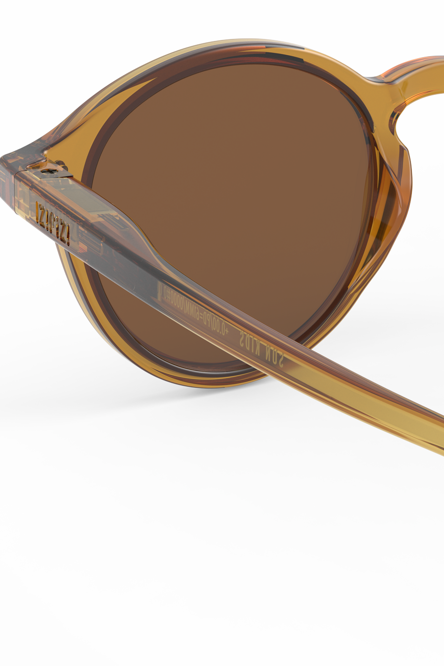 Close-up of Izipizi amber round sunglasses frame against a plain white background.