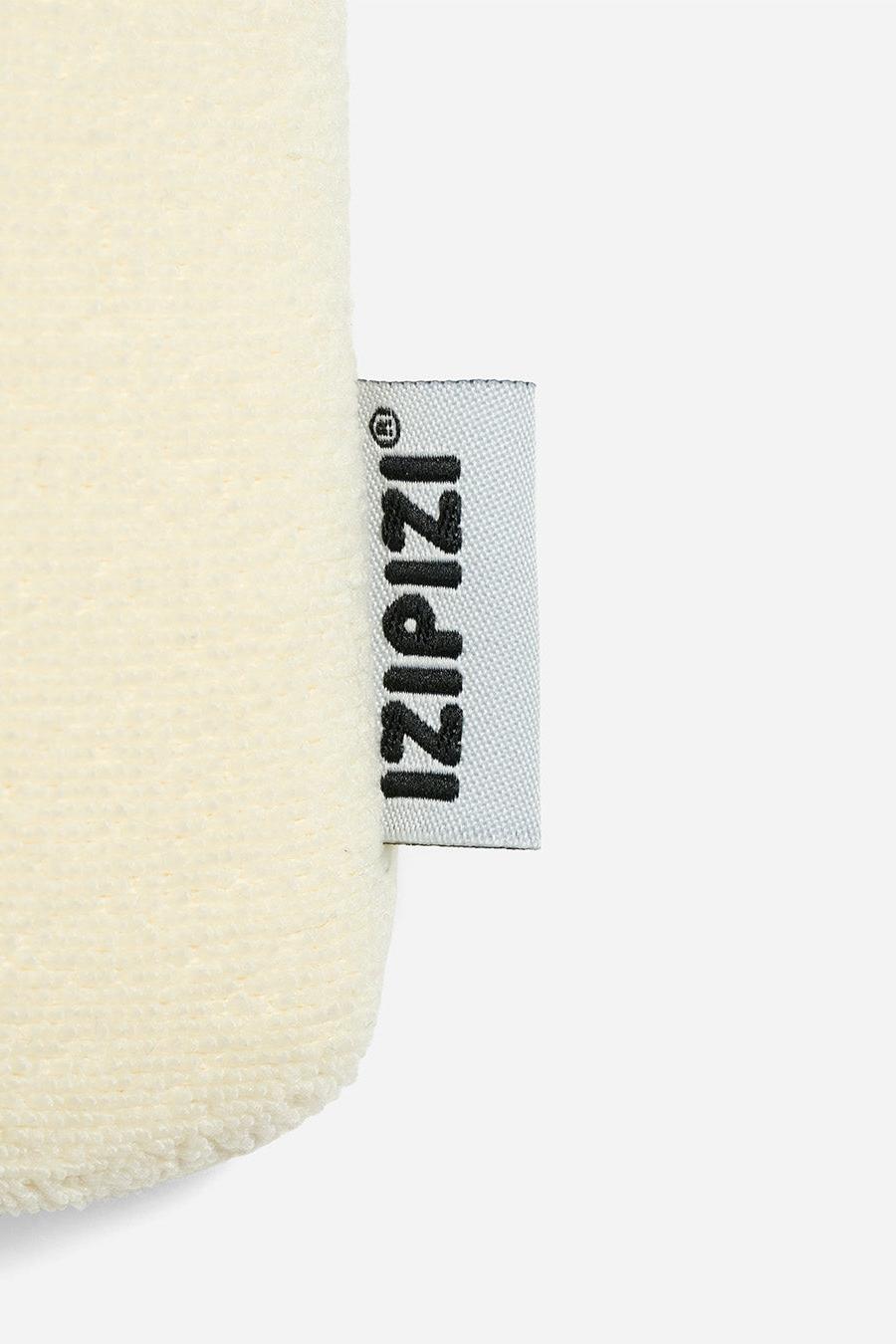 Close-up of a cream-colored glasses pouch with an IZIPIZI brand tag attached to the side