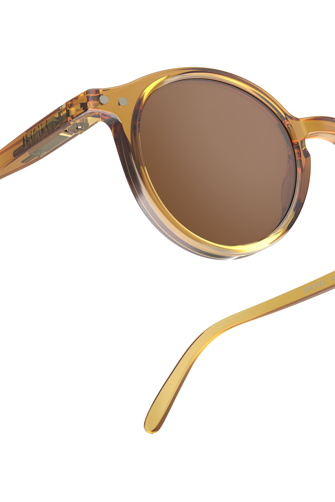 Izipizi Kids round sunglasses in amber with brown tinted lenses shown from a side perspective.