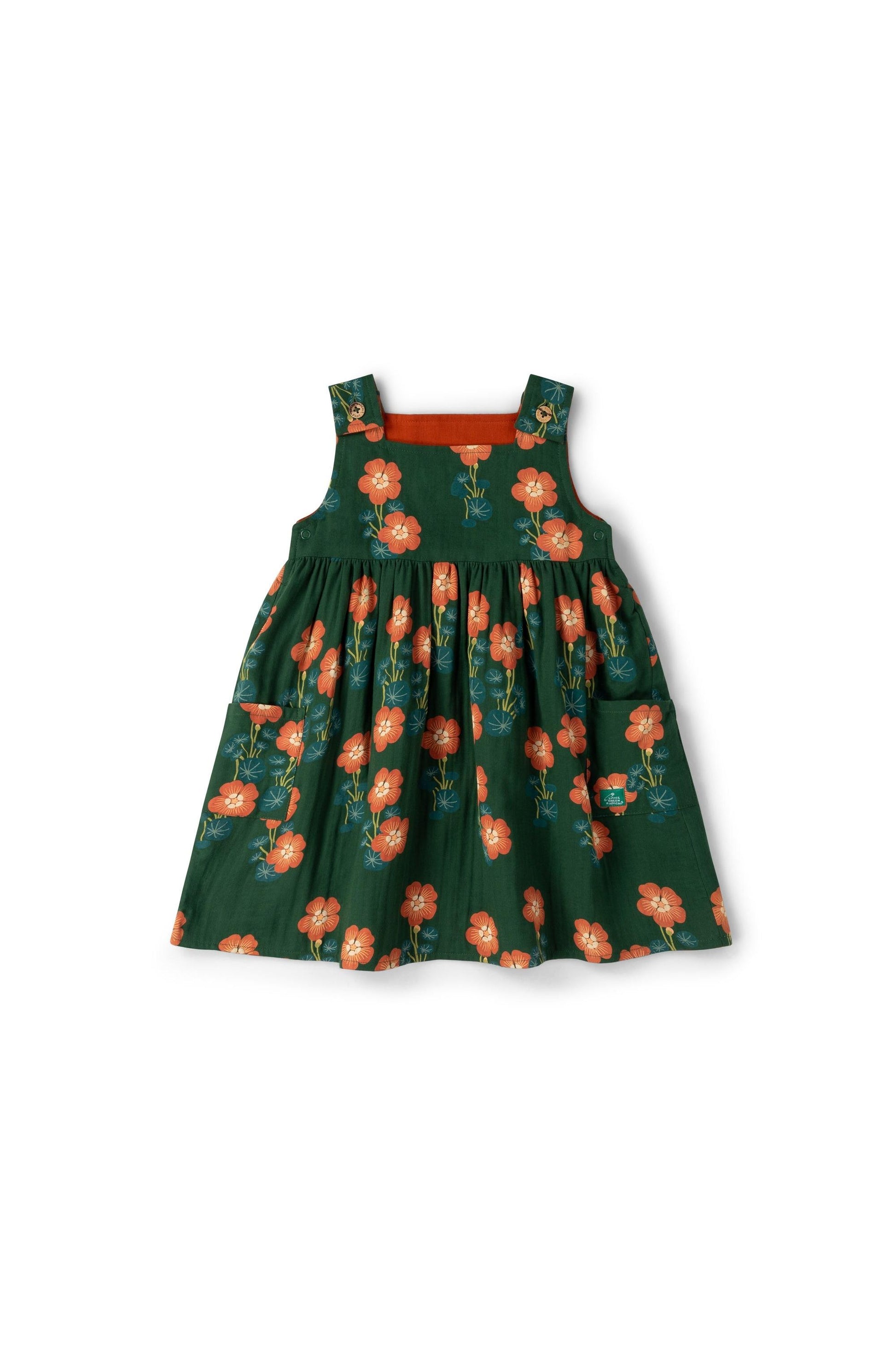Green dress with floral pattern on a white background
