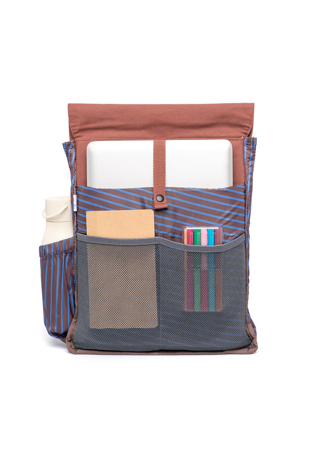Multifunctional bag with compartments and a water bottle holder on a white background