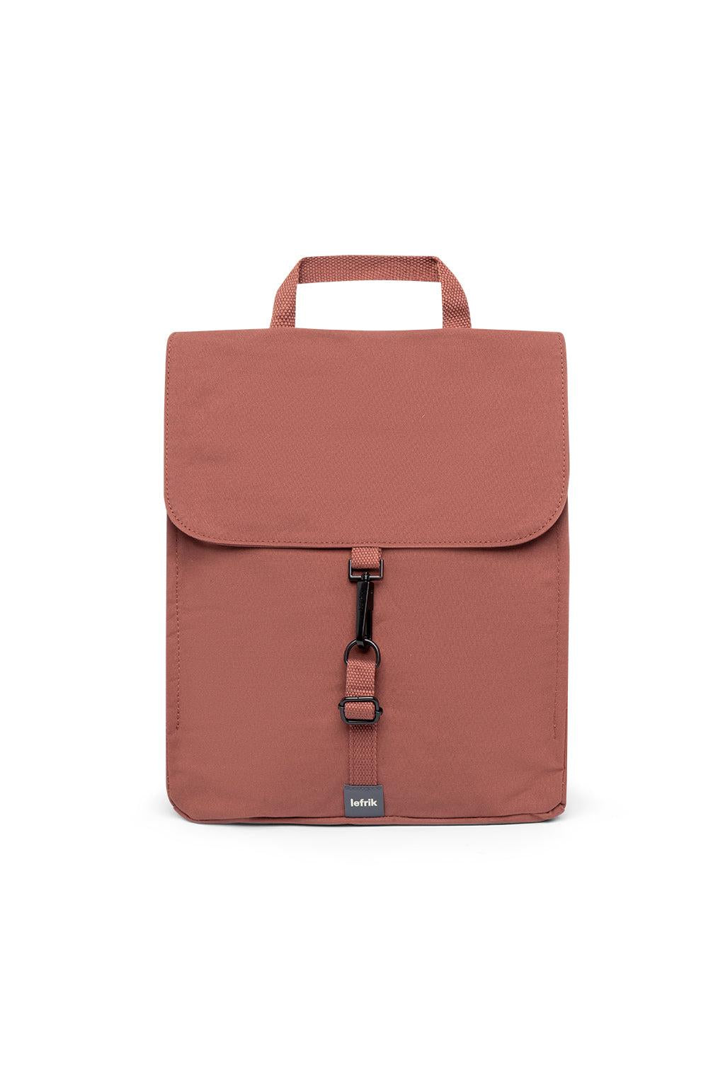 Brown backpack with a visible brand label on a white background