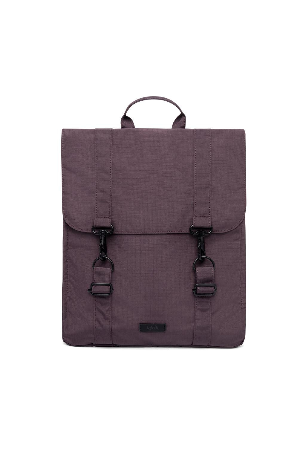 A dark plum purple backpack with a top handle, front flap pocket, and two black buckle straps, shown against a plain white background.