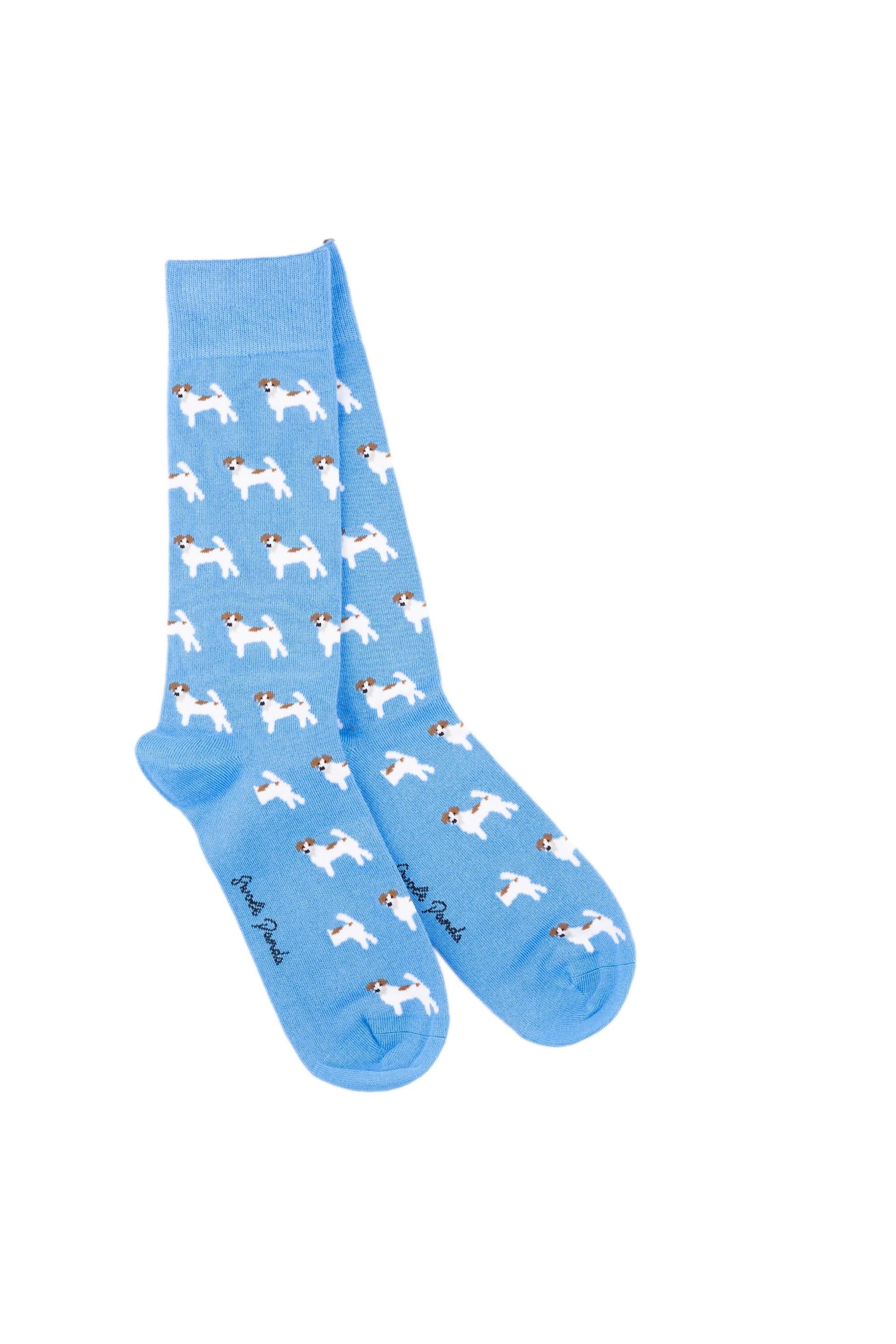 Pair of light blue bamboo socks featuring a small white and brown terrier dog pattern.