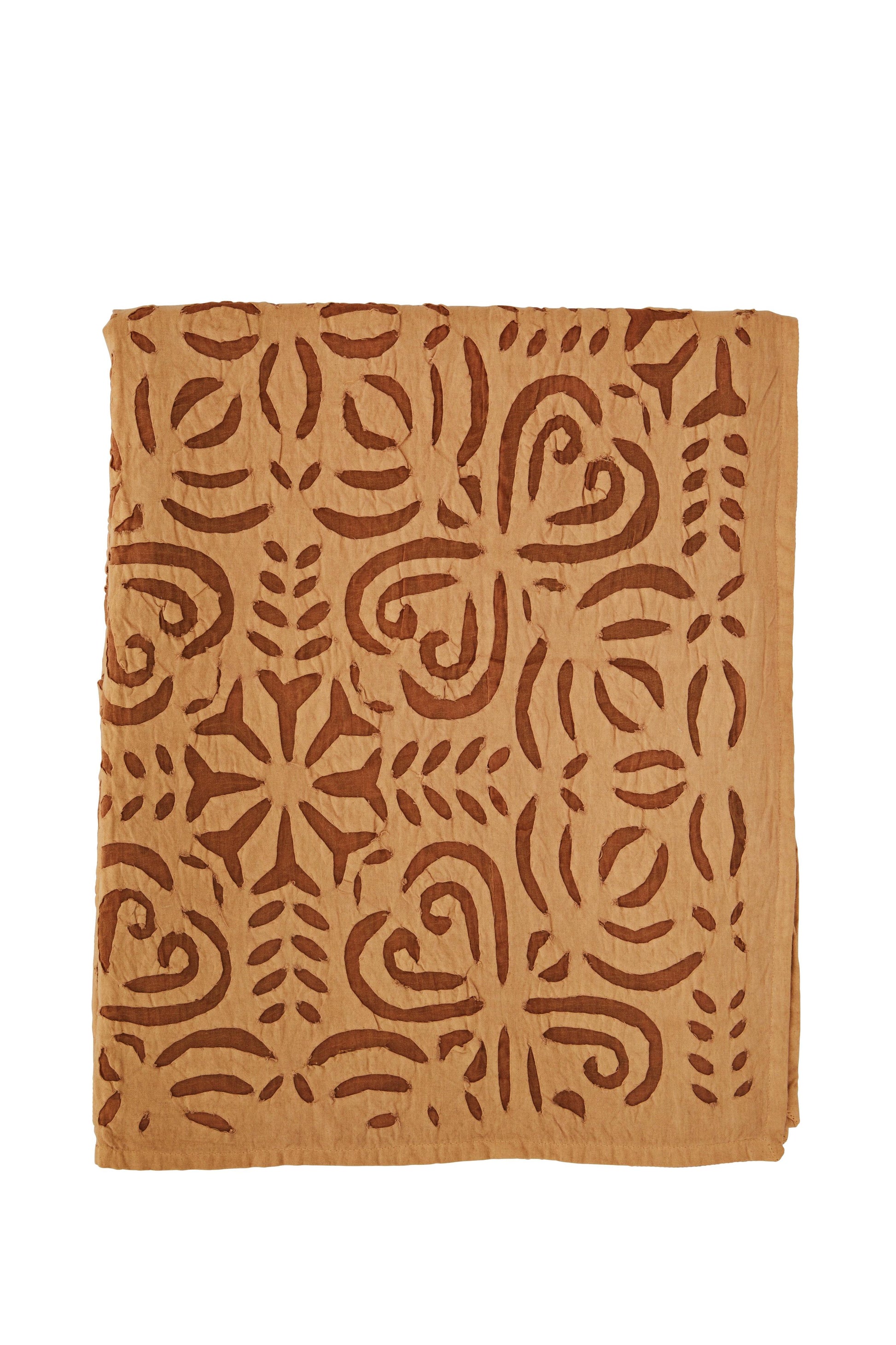Brown fabric with intricate pattern on a white background
