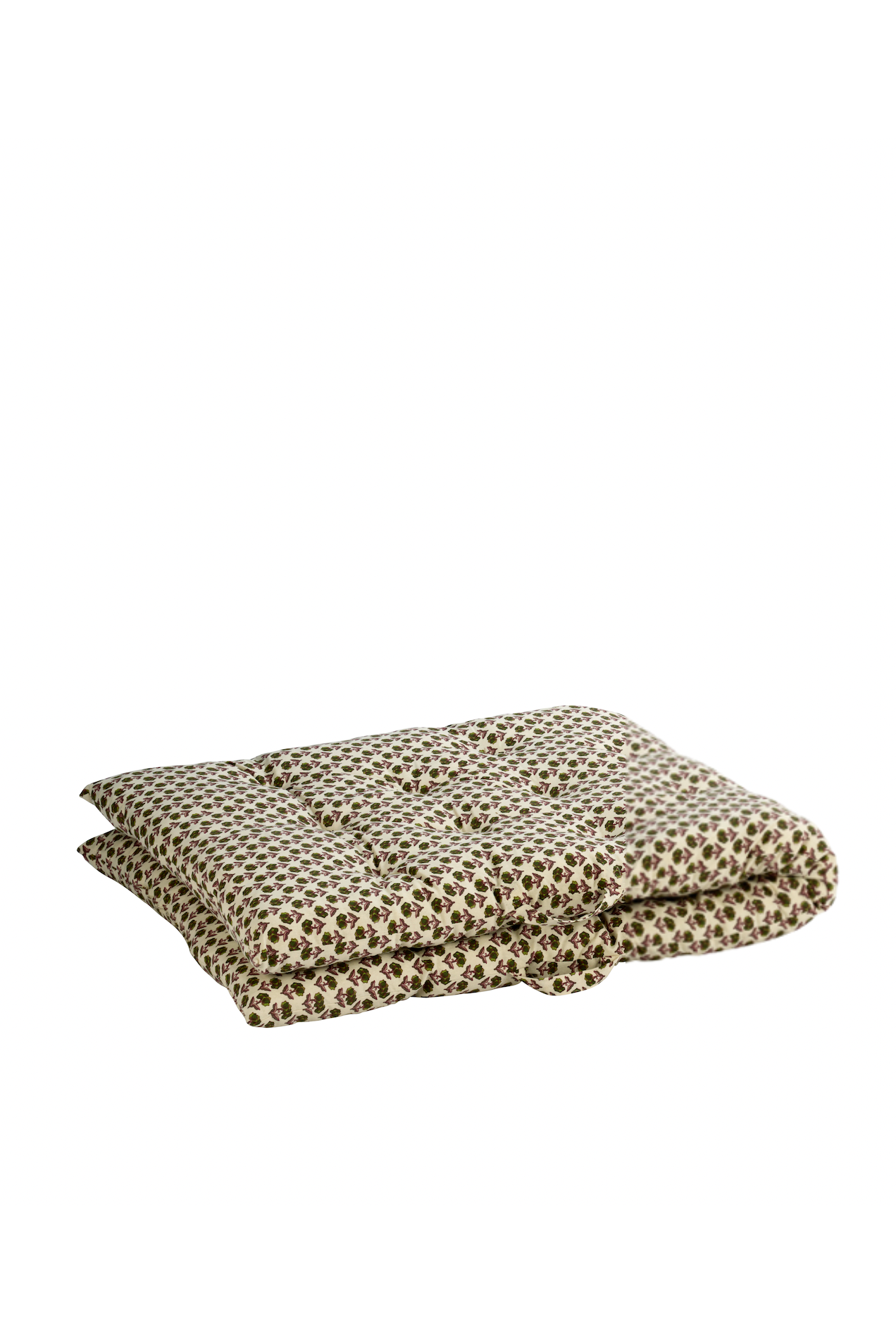 Folded mattress with a pattern on a white background
