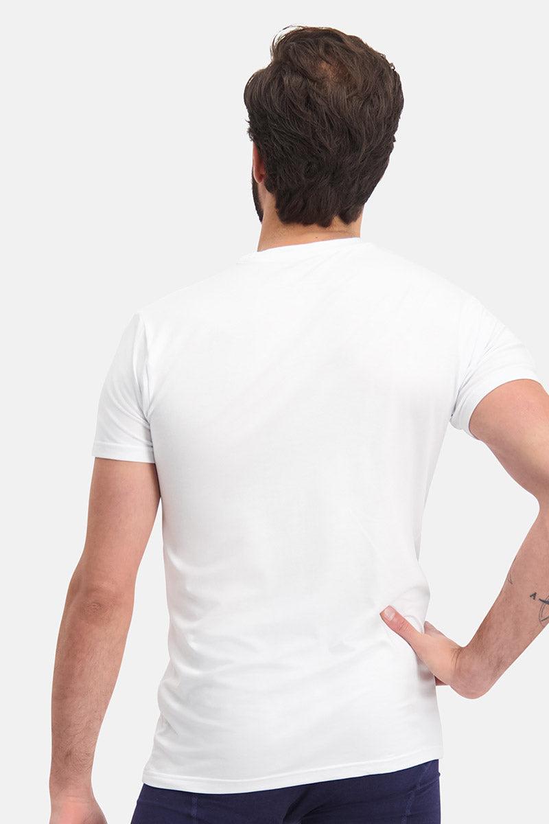 Man viewed from behind wearing a white bamboo fiber t-shirt against a white background