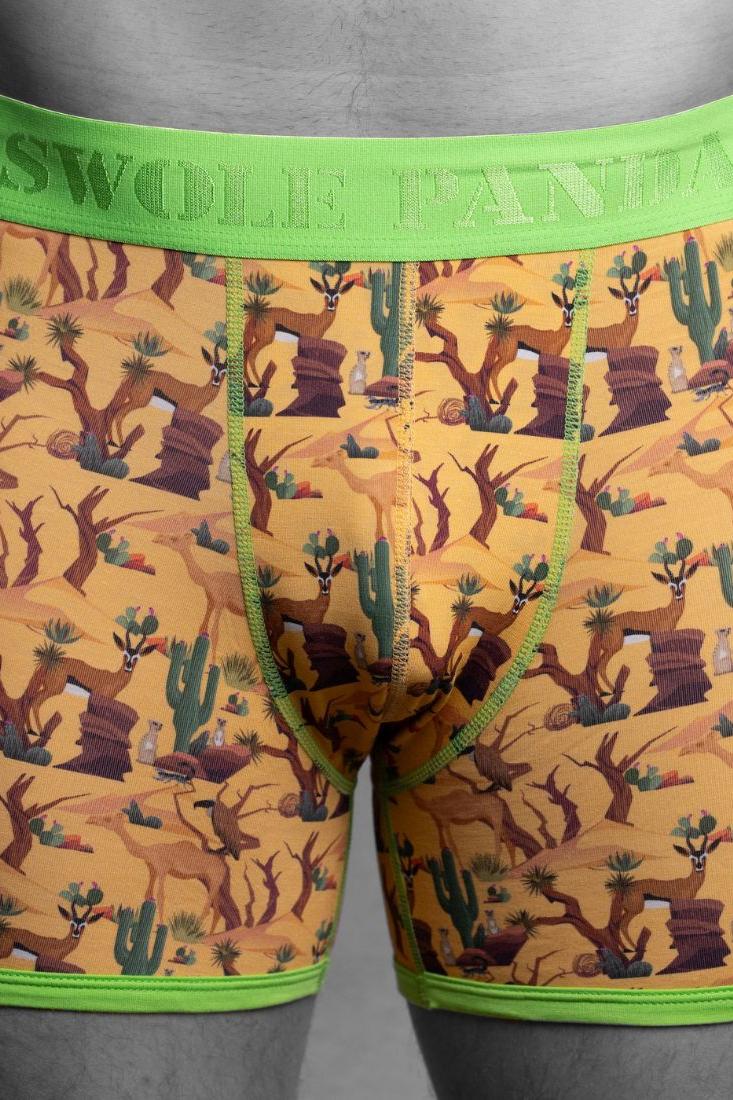 Close up of Swole Panda men's boxer briefs featuring a yellow desert animal print pattern.