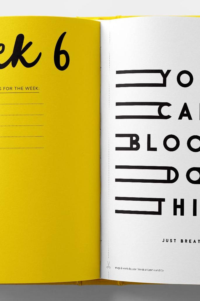 Open mindfulness journal showing Week 6 goal setting and motivational typography