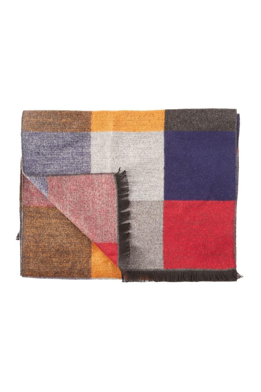 A foldable multicolor checked sustainable bamboo winter scarf with fringed edges.