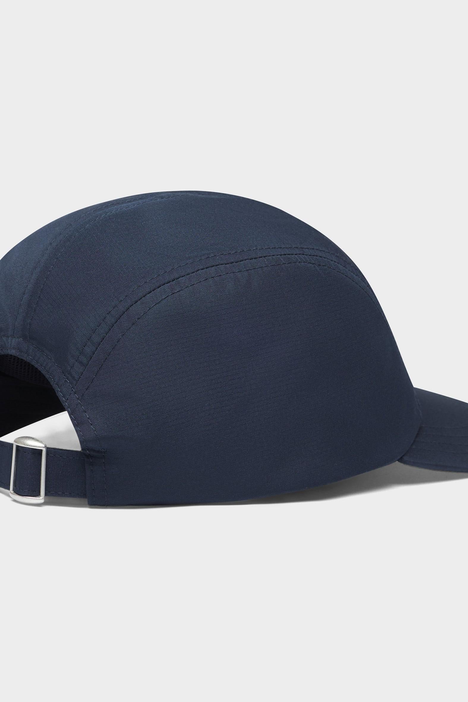 Navy cap with a strap on a white background