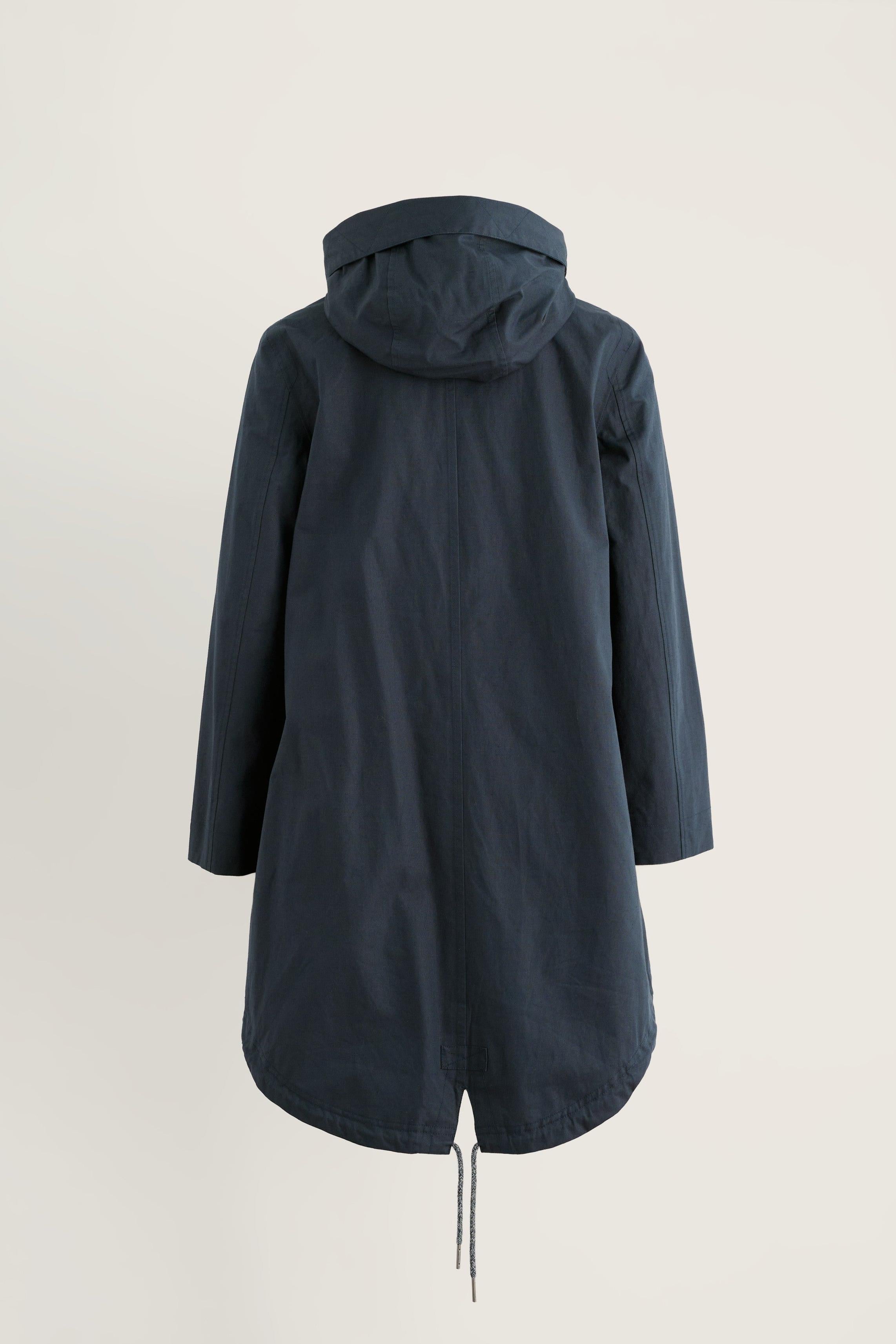 A dark navy hooded raincoat shown from the back, featuring a drawstring hem, displayed against a plain off-white background.