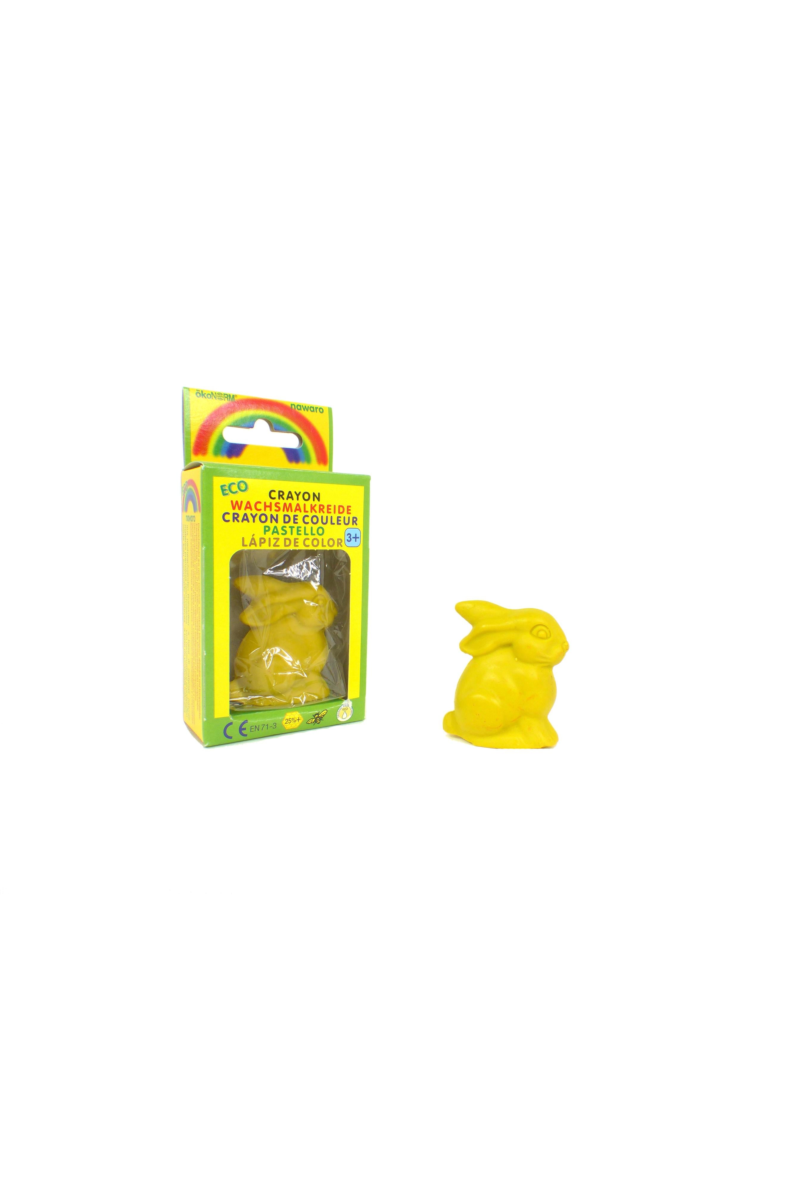 Yellow crayon-shaped bunny with packaging on a white background