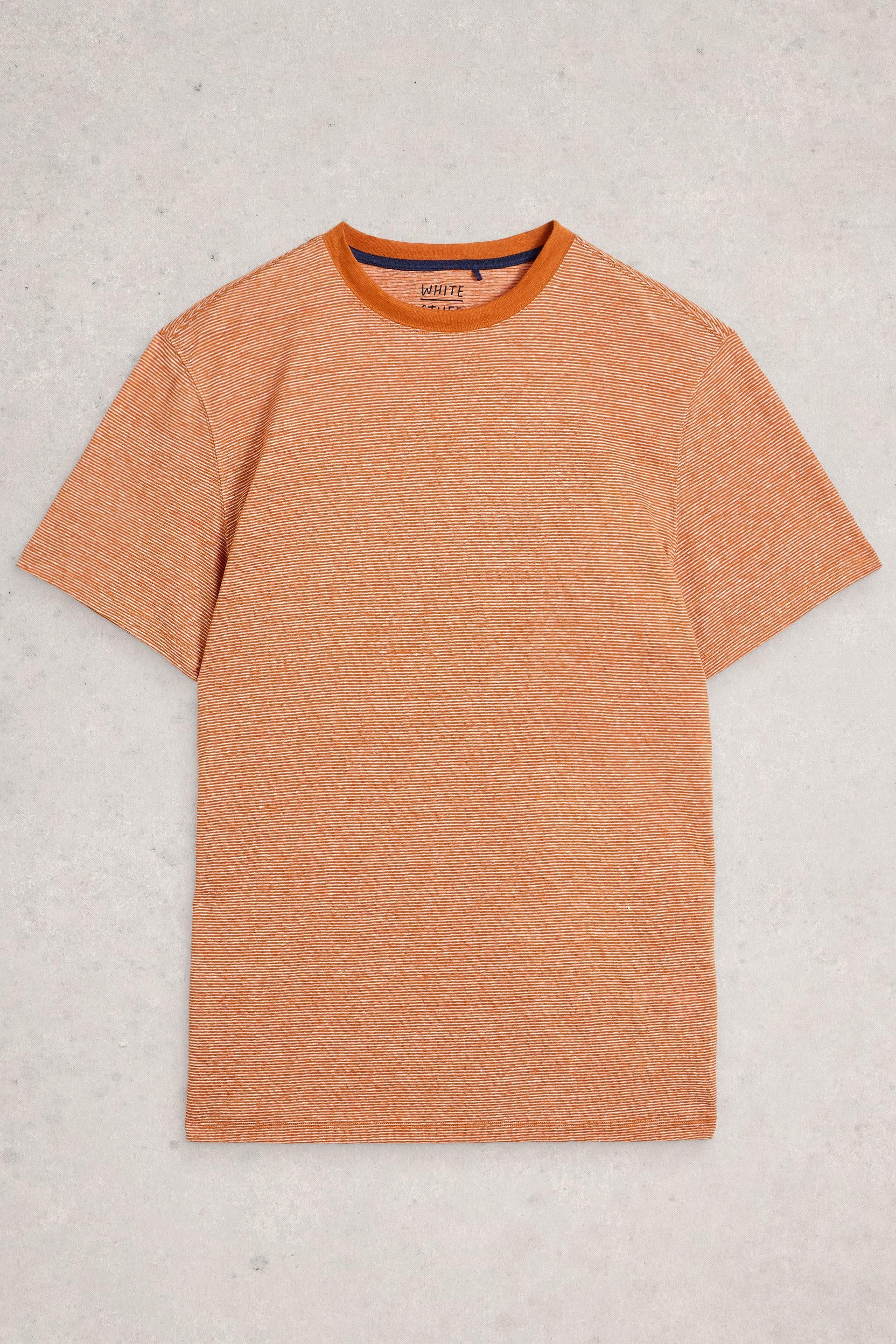 Orange and white striped men's 100% linen t-shirt laid flat on a light grey background.