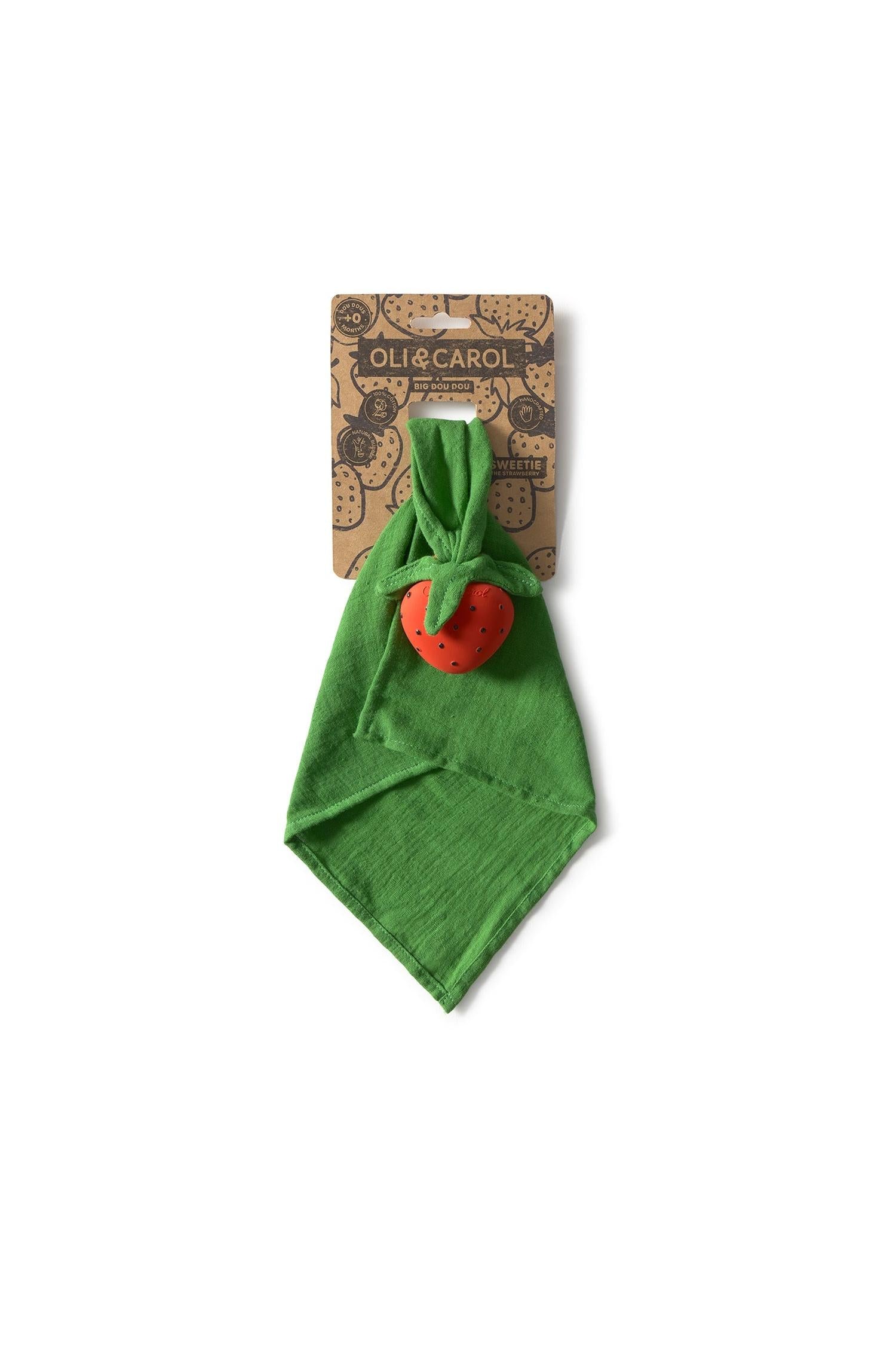 Oli & Carol strawberry plush toy for infants, with organic cotton squares and non-toxic rubber fruit detail.