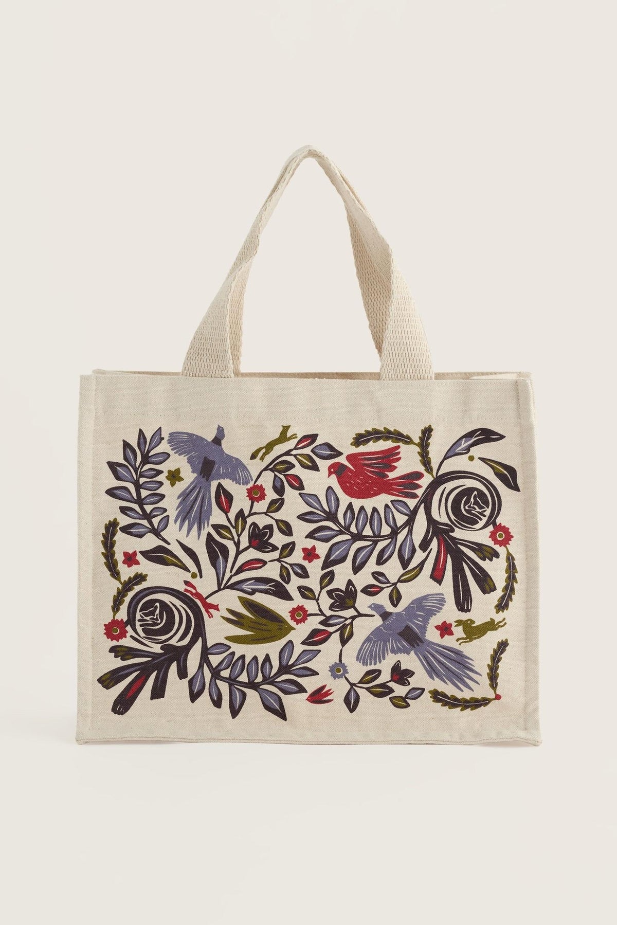 Seasalt Cornwall organic cotton canvas shopping bag with folk-art style bird and floral print.