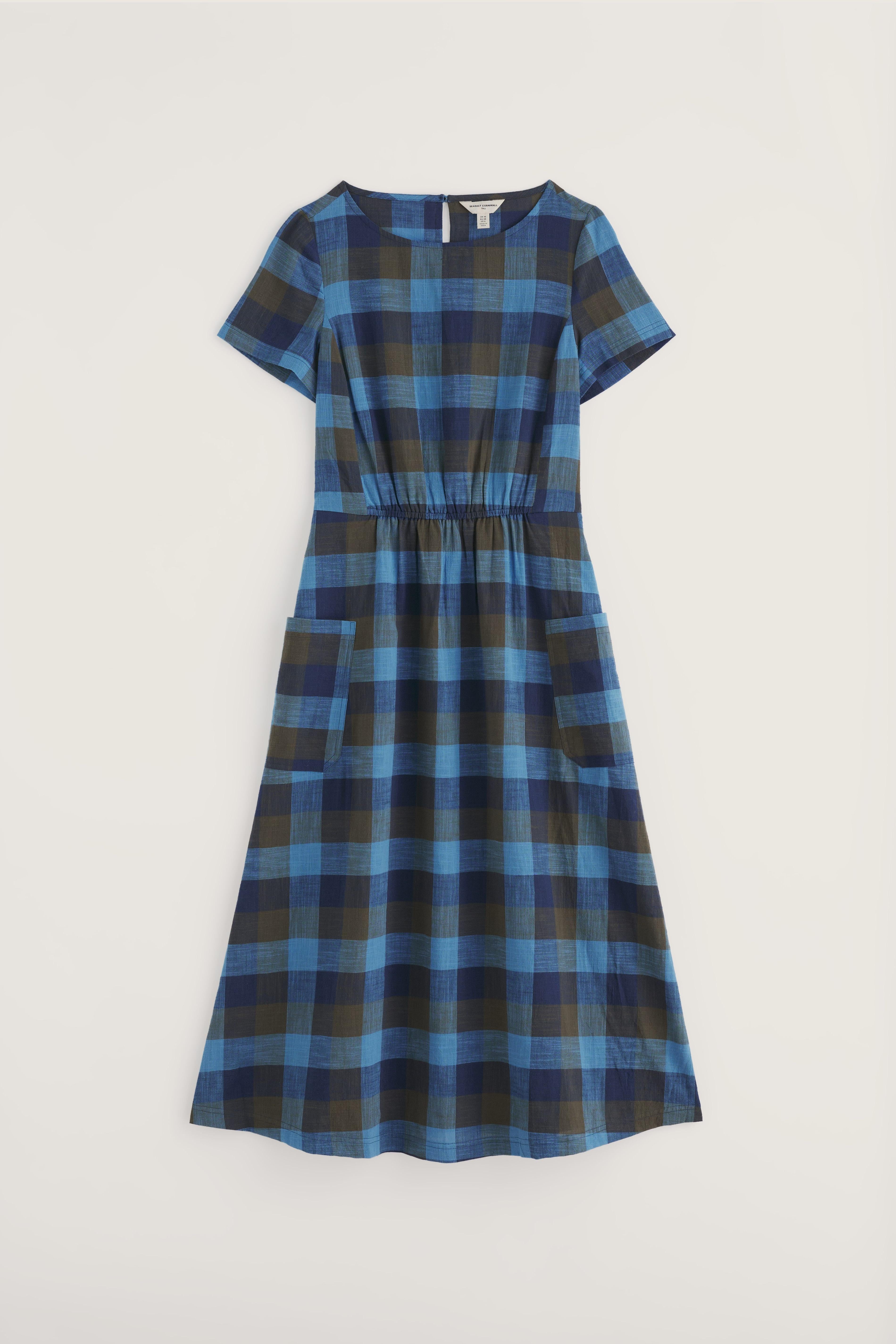 Blue and green plaid dress on a light gray background