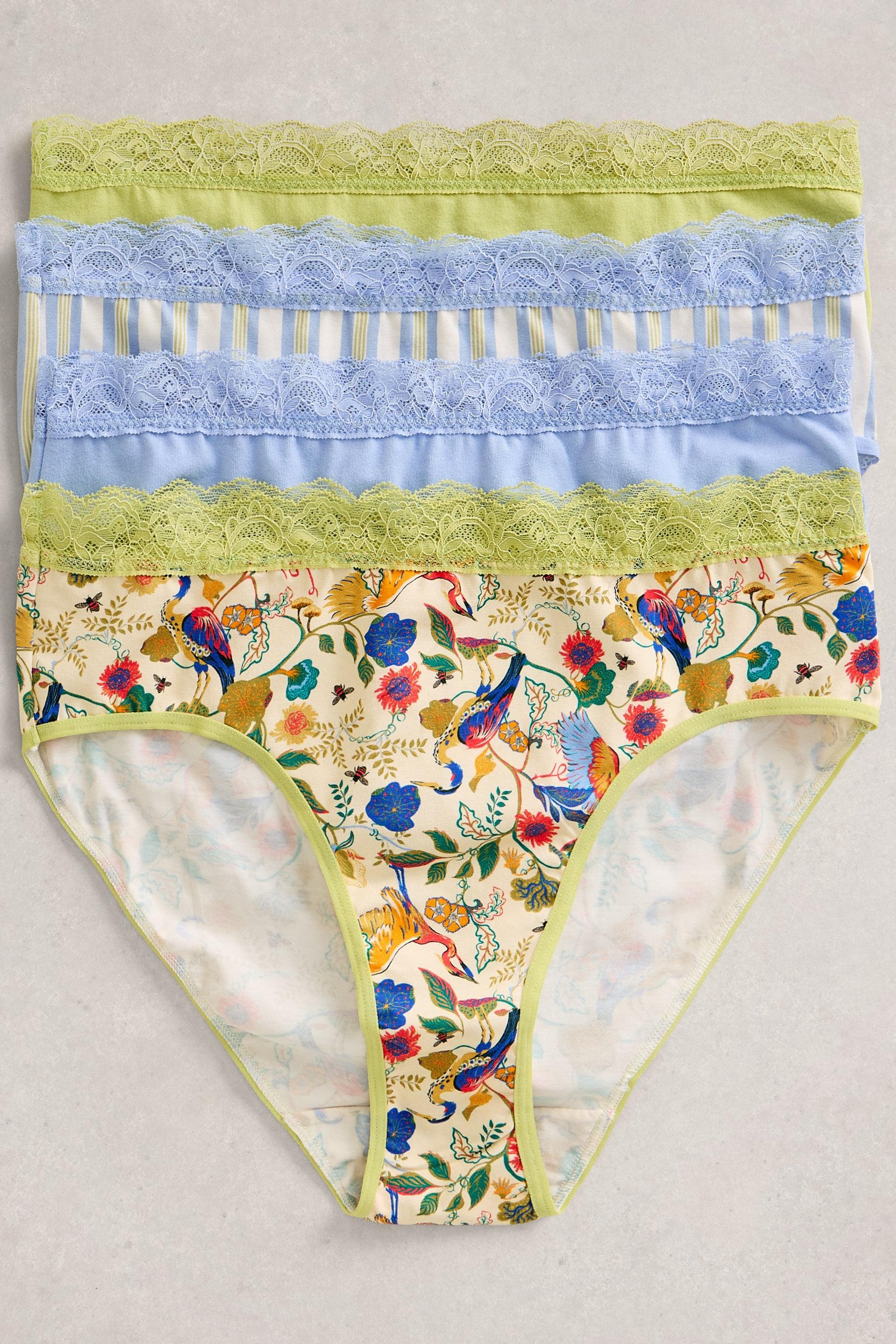 Stack of White Stuff organic cotton briefs featuring floral patterns and delicate lace trim detail.