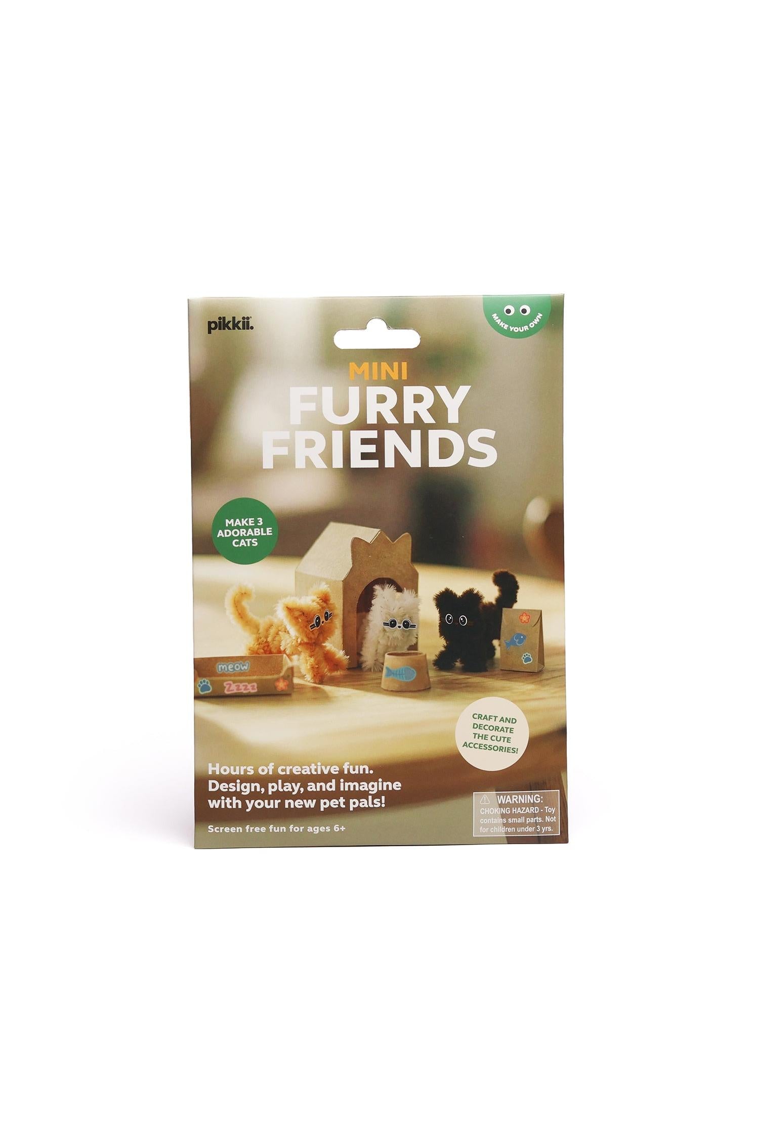 Pakkaged of Mini Furry Friends craft kit with three small cat figurines on a white background