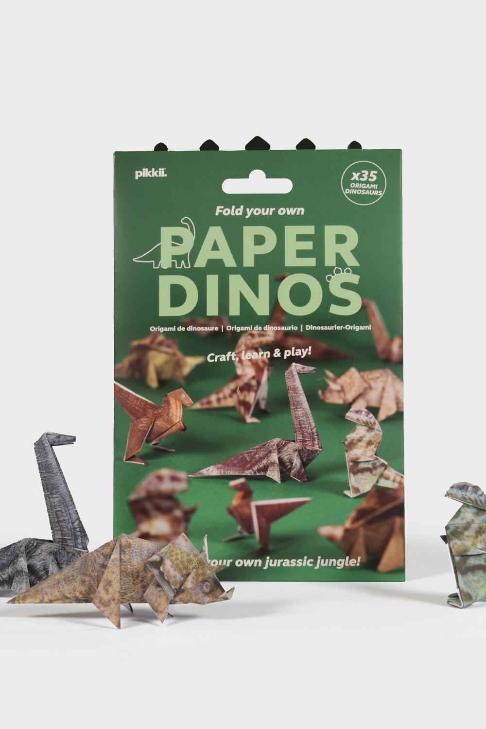 Packaging of 'Fold your own Paper Dinos' with origami dinosaur models displayed in front.