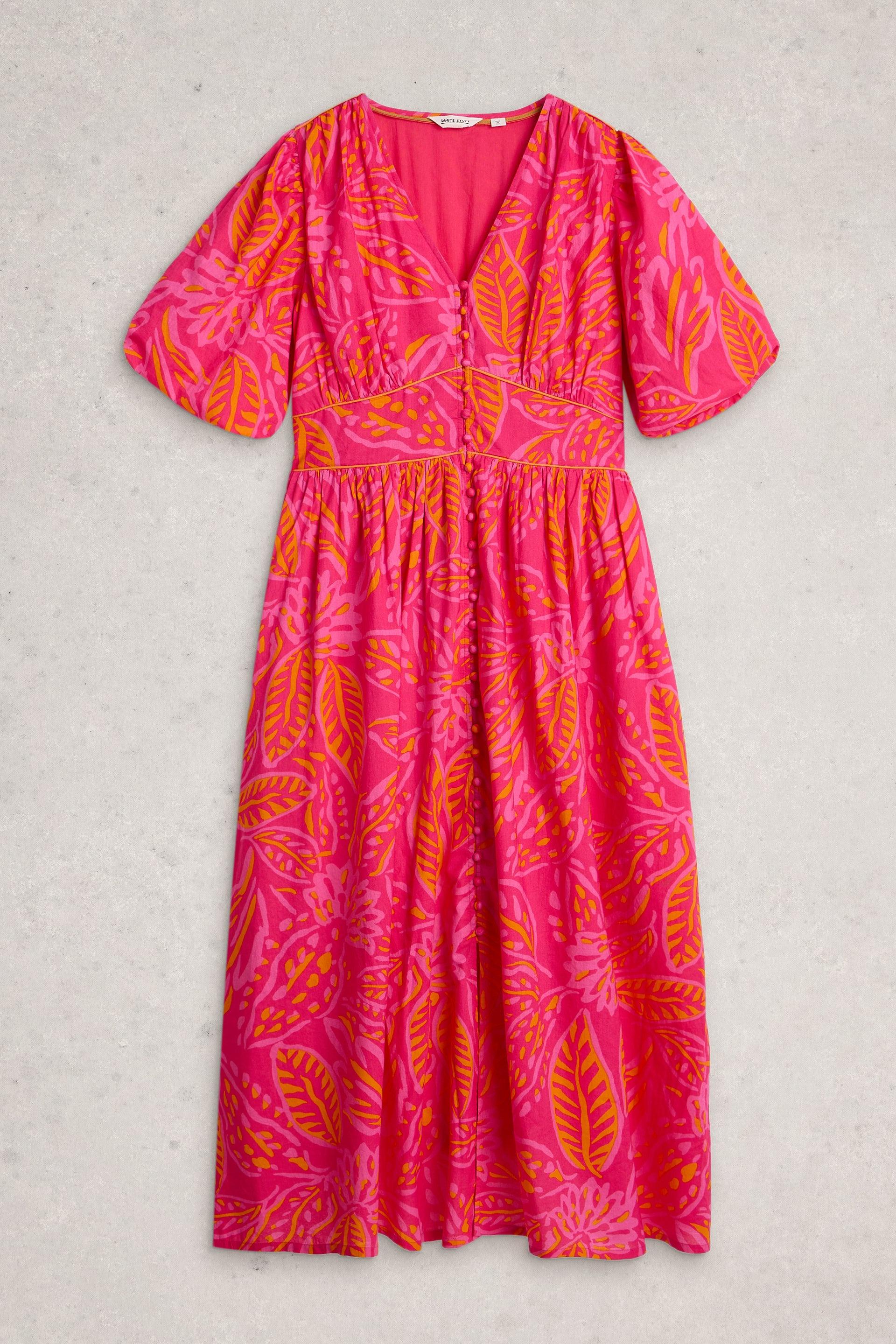 Pink organic cotton midi dress with an orange leaf print pattern and button-down front.