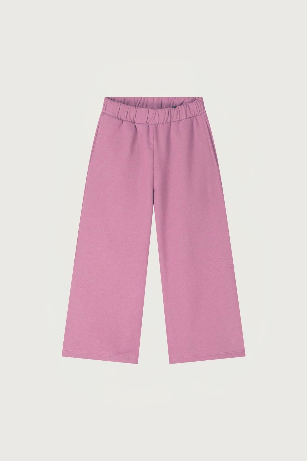 Pink pants on a light gray background