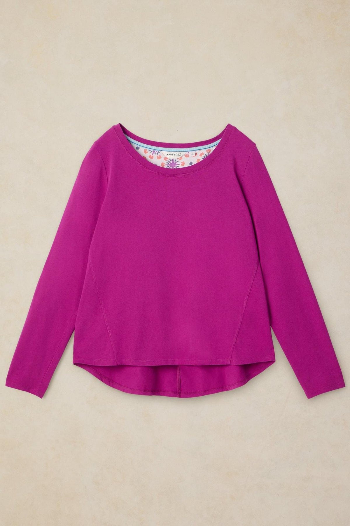 A long-sleeved pink organic cotton pyjama top by White Stuff, displayed flat against a neutral background.