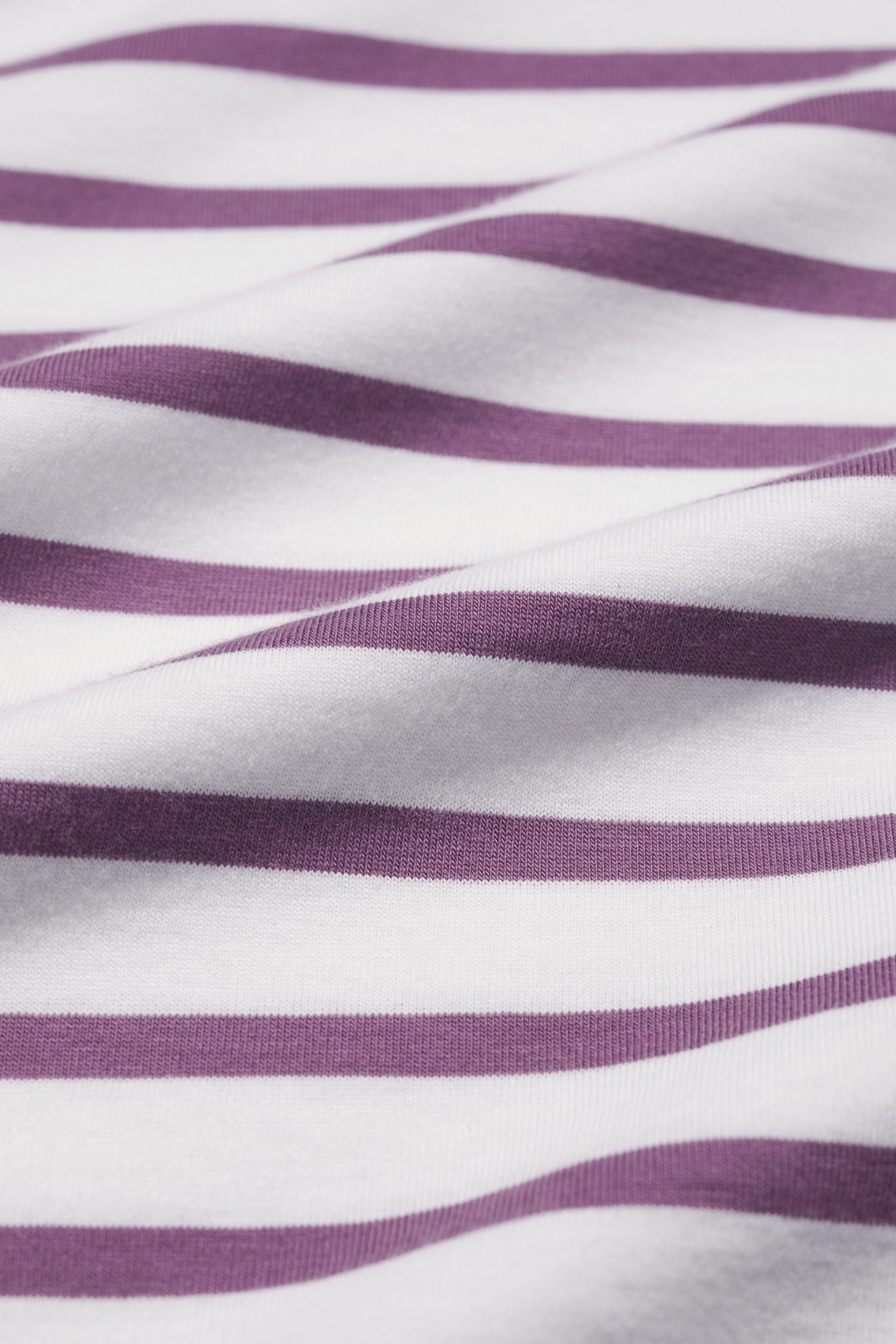 Close-up of purple and white striped fabric